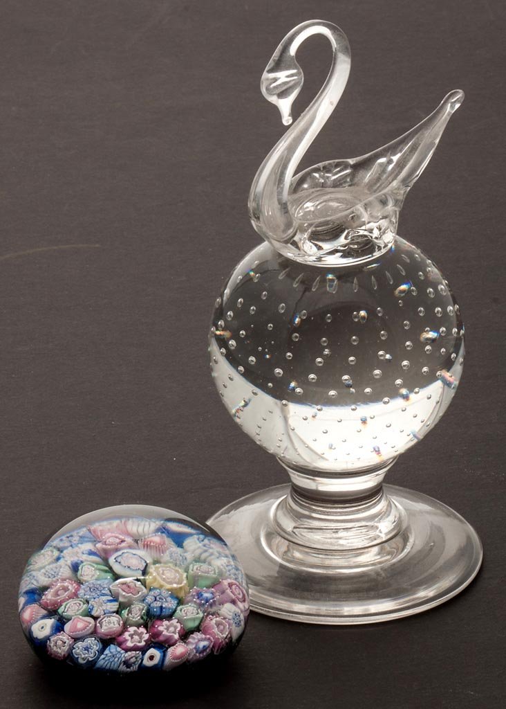 PAIRPOINT PAPERWEIGHTS, LOT OF TWO: PAIRPOINT PAPERWEIGHTS, LOT OF TWO, comprising a millefiori example with Clichy rose and heart canes, singed with "P" in diamond under base, and a swan-top controlled air-bubble pedestal example, not 