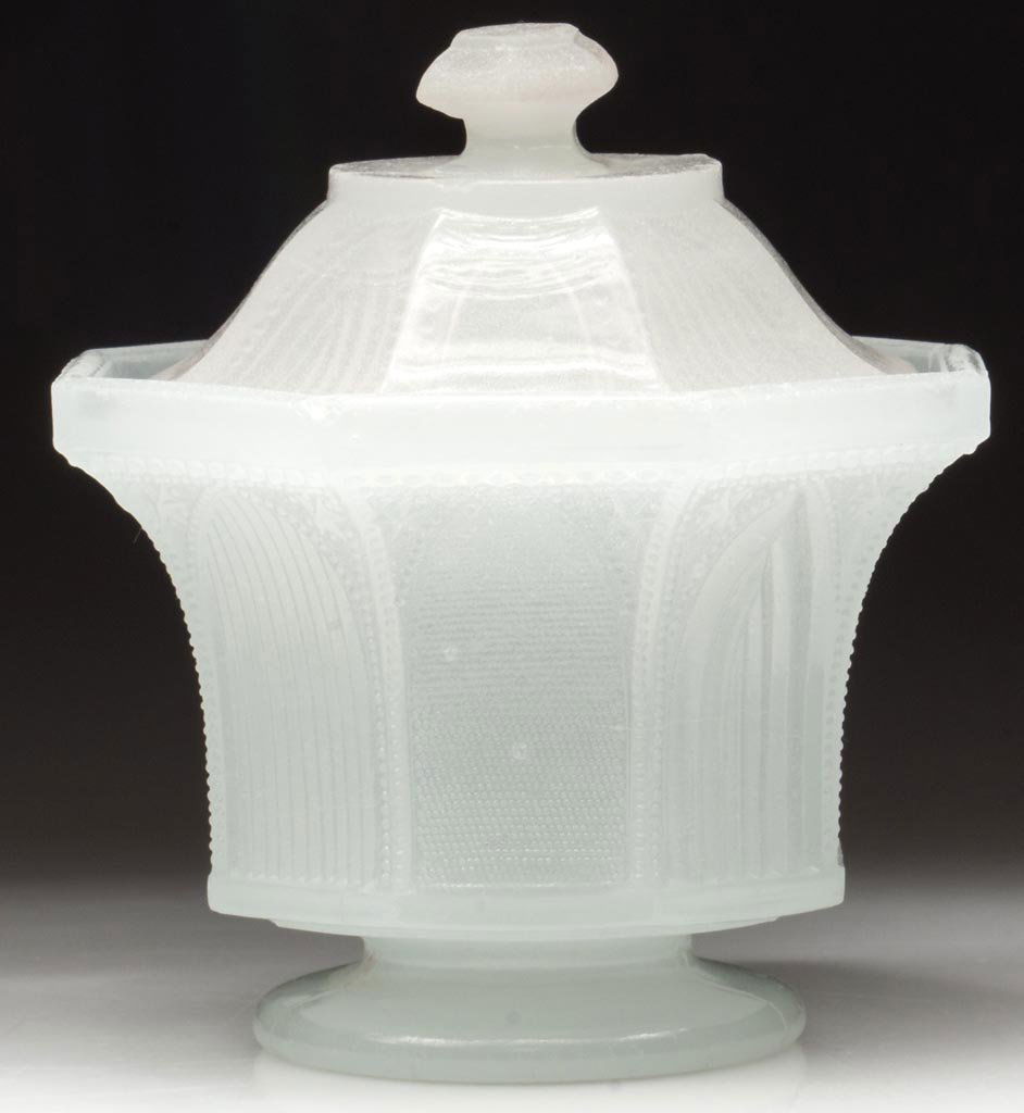 PRESSED LACY GOTHIC ARCH SUGAR BOWL AND COVER: PRESSED LACY GOTHIC ARCH SUGAR BOWL AND COVER, alabaster/clambroth with a slightly sanded surface, octagonal bowl with four different arch designs and a plain rim, raised on a circular foot, slightly