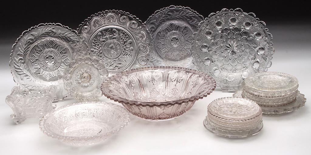 ASSORTED PRESSED LACY AND RELATED TABLE ARTICLES, LOT O: ASSORTED PRESSED LACY AND RELATED TABLE ARTICLES, LOT OF 20, colorless, including two marked "T & J Robinson Pittsbg" plates, a "George Washington" and Acorn plate, and a Lee/Rose No. 32 pontiled cup 