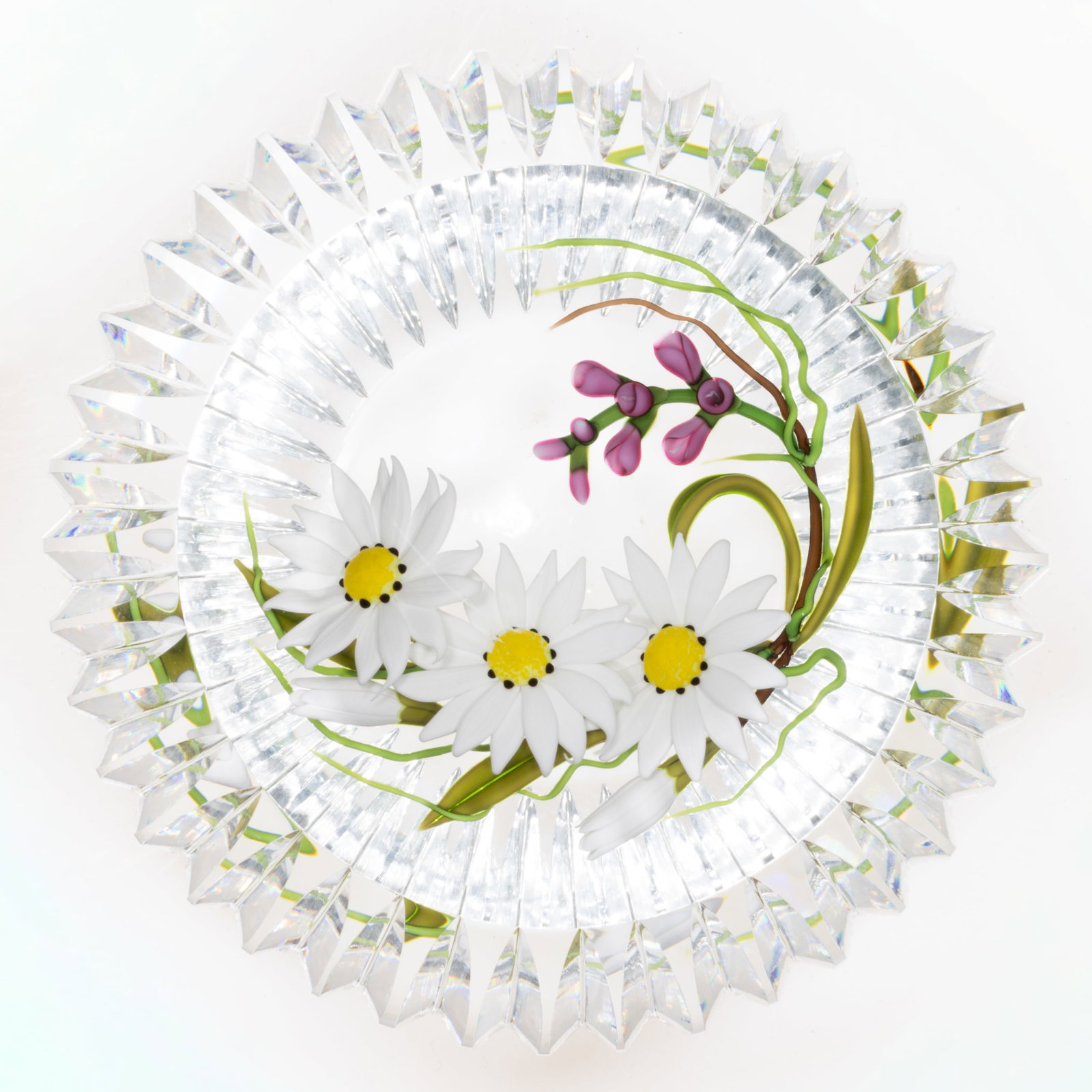 CHRIS BUZZINI (AMERICAN, B. 1949) FANCY CUT MIXED BOUQUET LAMPWORK STUDIO ART GLASS PAPERWEIGHT: CHRIS BUZZINI (AMERICAN, B. 1949) FANCY CUT MIXED BOUQUET LAMPWORK STUDIO ART GLASS PAPERWEIGHT, concave circular top window with long vertical prism cuts to the side, crescent form bouquet featuring&