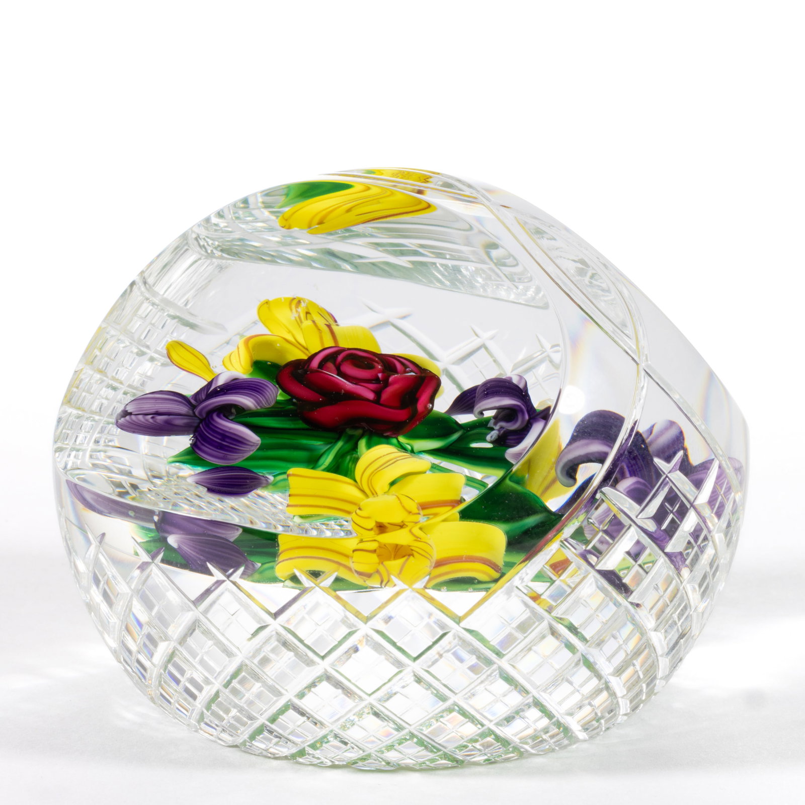 BOB BANFORD (AMERICAN, B. 1951) BASKET CUT ROSE AND IRISES BOUQUET LAMPWORK STUDIO ART GLASS: BOB BANFORD (AMERICAN, B. 1951) BASKET CUT ROSE AND IRISES BOUQUET LAMPWORK STUDIO ART GLASS PAPERWEIGHT, cross-hatched diamond cuts to the lower body with a twisting cut handle over the top, two larg
