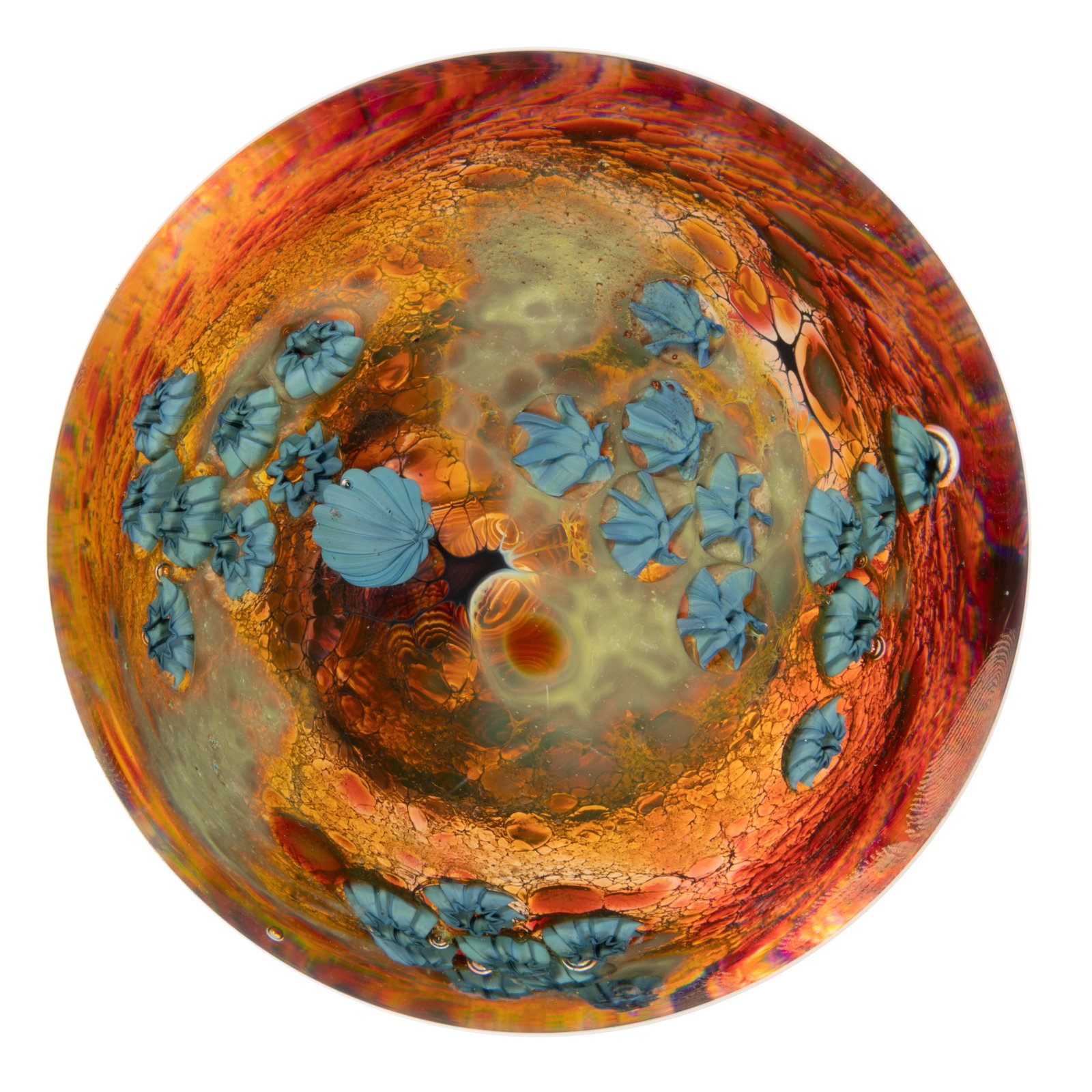 JOSH SIMPSON (AMERICAN, B. 1949) INHABITED PLANET STUDIO ART GLASS PAPERWEIGHT: JOSH SIMPSON (AMERICAN, B. 1949) INHABITED PLANET STUDIO ART GLASS PAPERWEIGHT, interior mottled core with an amber and cranberry mottled exterior with scattered blue millefiori canes, signed to the u