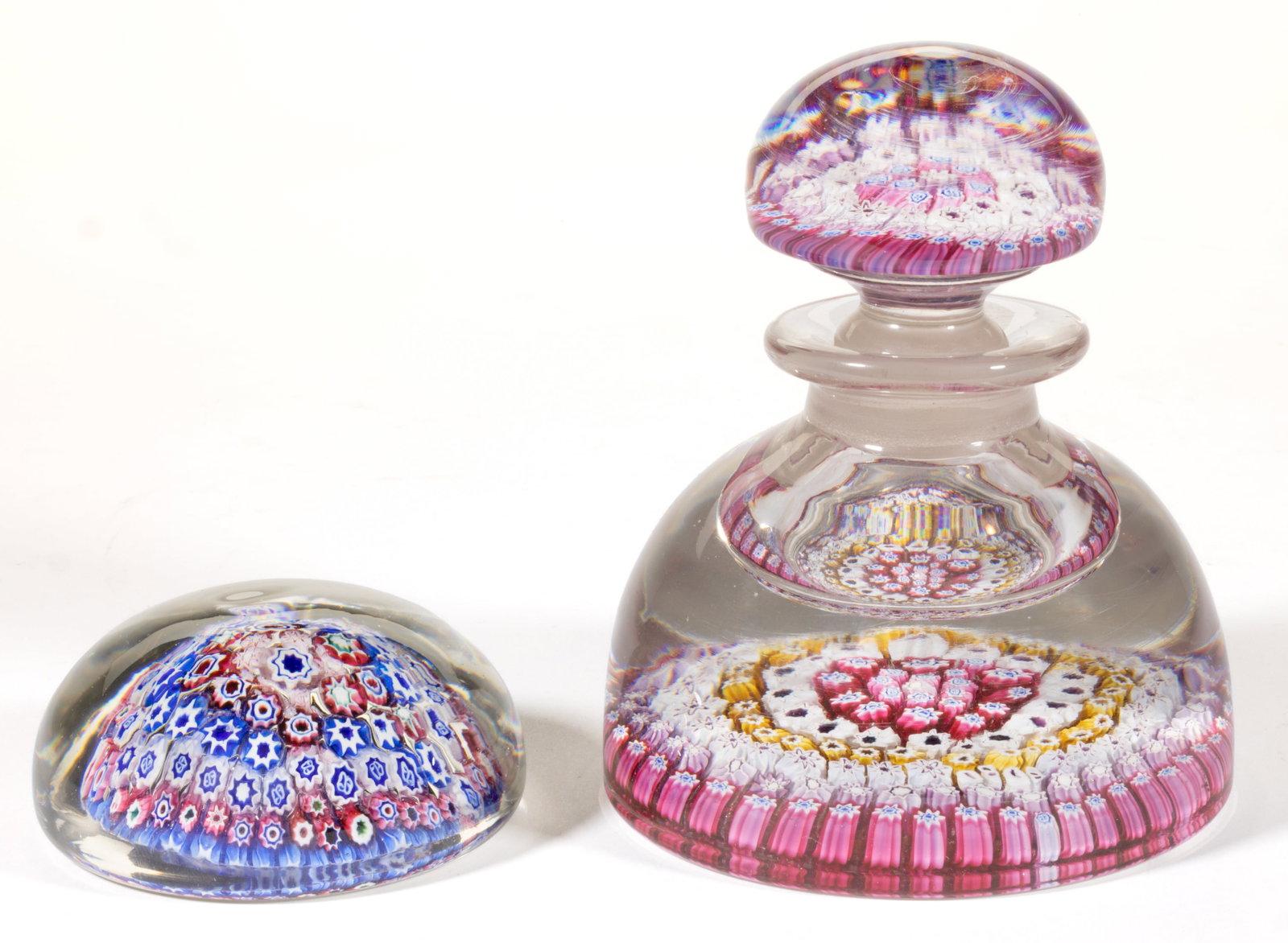 ANTIQUE ENGLISH CONCENTRIC MILLEFIORI ART GLASS PAPERWEIGHT INKWELL: ANTIQUE ENGLISH CONCENTRIC MILLEFIORI ART GLASS PAPERWEIGHT INKWELL, two interior garland of rose, white, and blue cogs, followed by a ring of white and blue cogs, fourth band featuring amber and whit