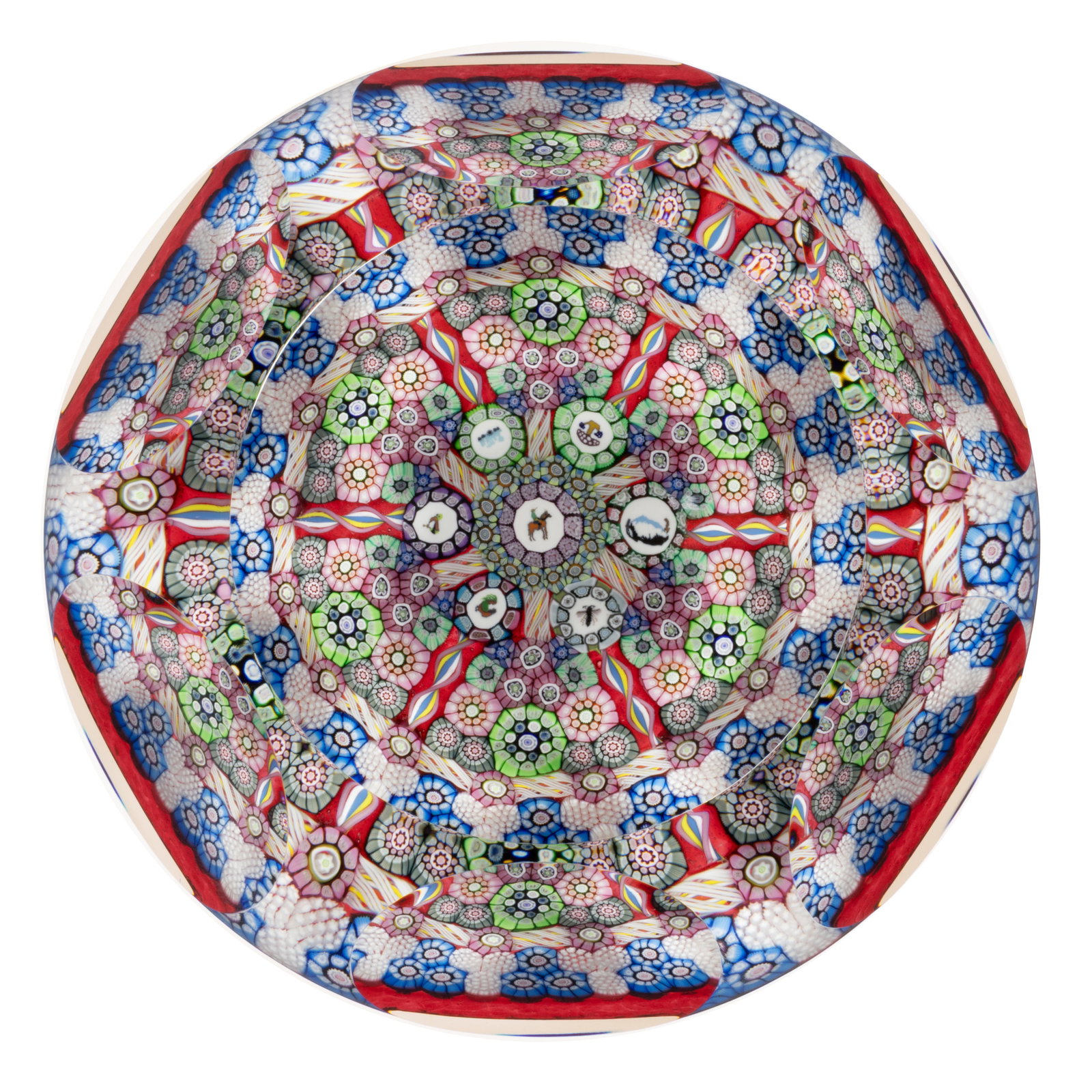 VINTAGE PERTHSHIRE SPOKE MILLEFIORI ART GLASS MAGNUM PAPERWEIGHT: VINTAGE PERTHSHIRE SPOKE MILLEFIORI ART GLASS MAGNUM PAPERWEIGHT, cut-faceted with a large concave circular top window, central silhouette cane depicting a man on a horse circled by six additional sil