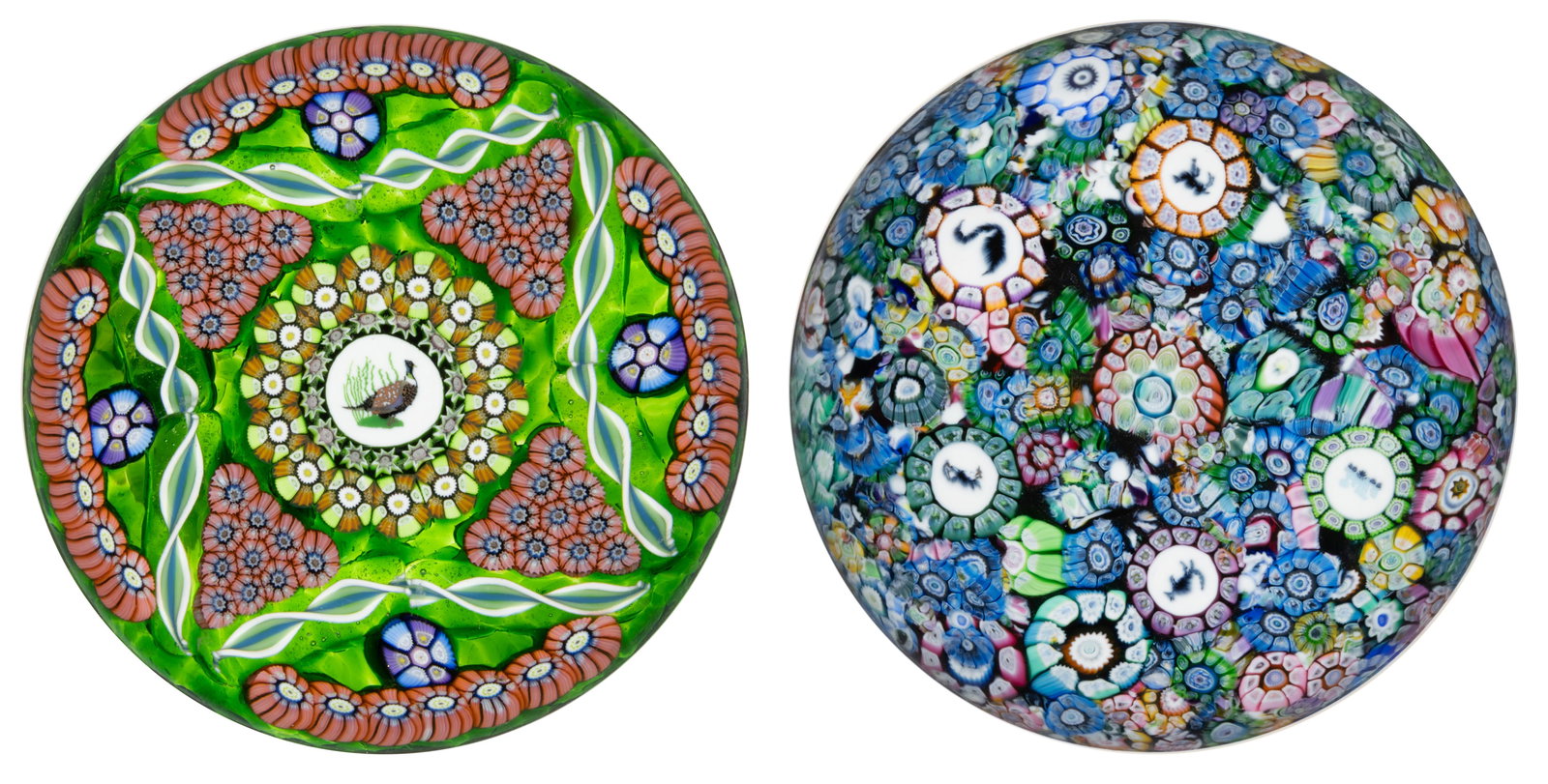 VINTAGE PERTHSHIRE SILHOUETTE MILLEFIORI ART GLASS PAPERWEIGHTS, LOT OF TWO: VINTAGE PERTHSHIRE SILHOUETTE MILLEFIORI ART GLASS PAPERWEIGHTS, LOT OF TWO, comprising a scrambled millefiori with five silhouette canes including a swan, camel, a train, a kangaroo, and a puffin, al