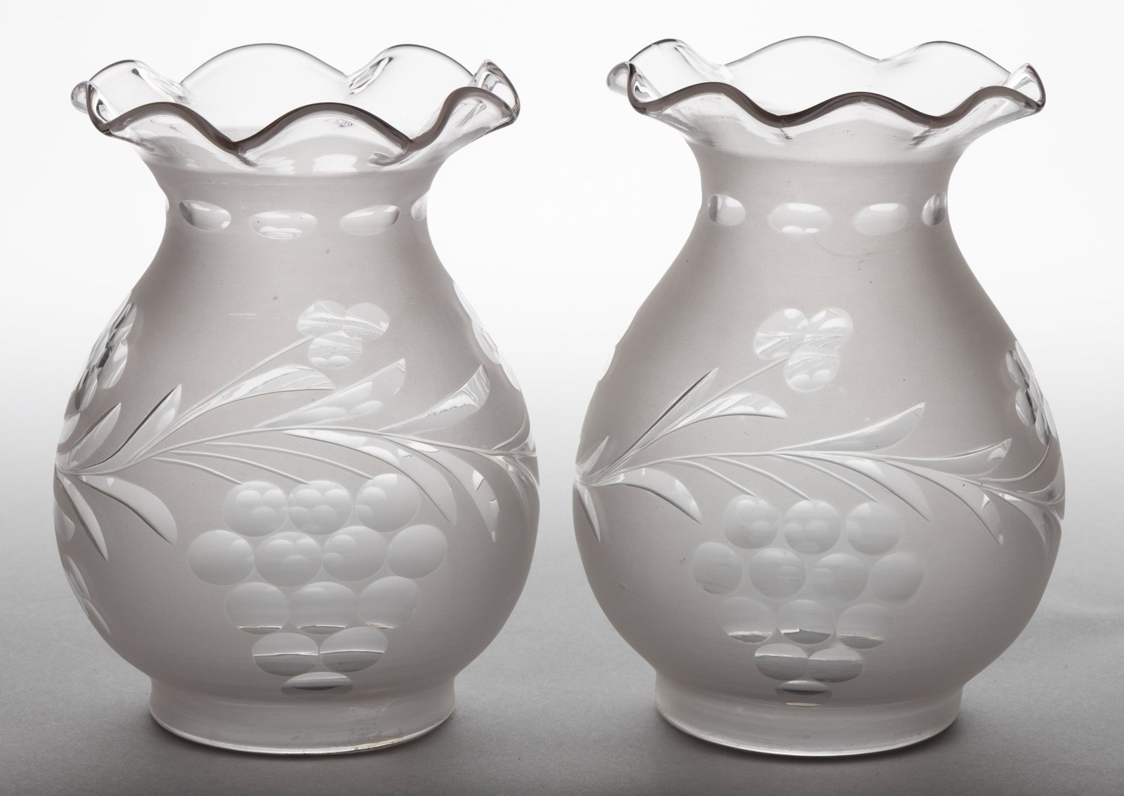 BLOWN CUT AND ENGRAVED LAMP SHADES, PAIR: BLOWN CUT AND ENGRAVED LAMP SHADES, PAIR, colorless with frosted finish, baluster forms with tapered and scalloped rims, stylized band of foliage, floral and Vintage/grape cuttings to t