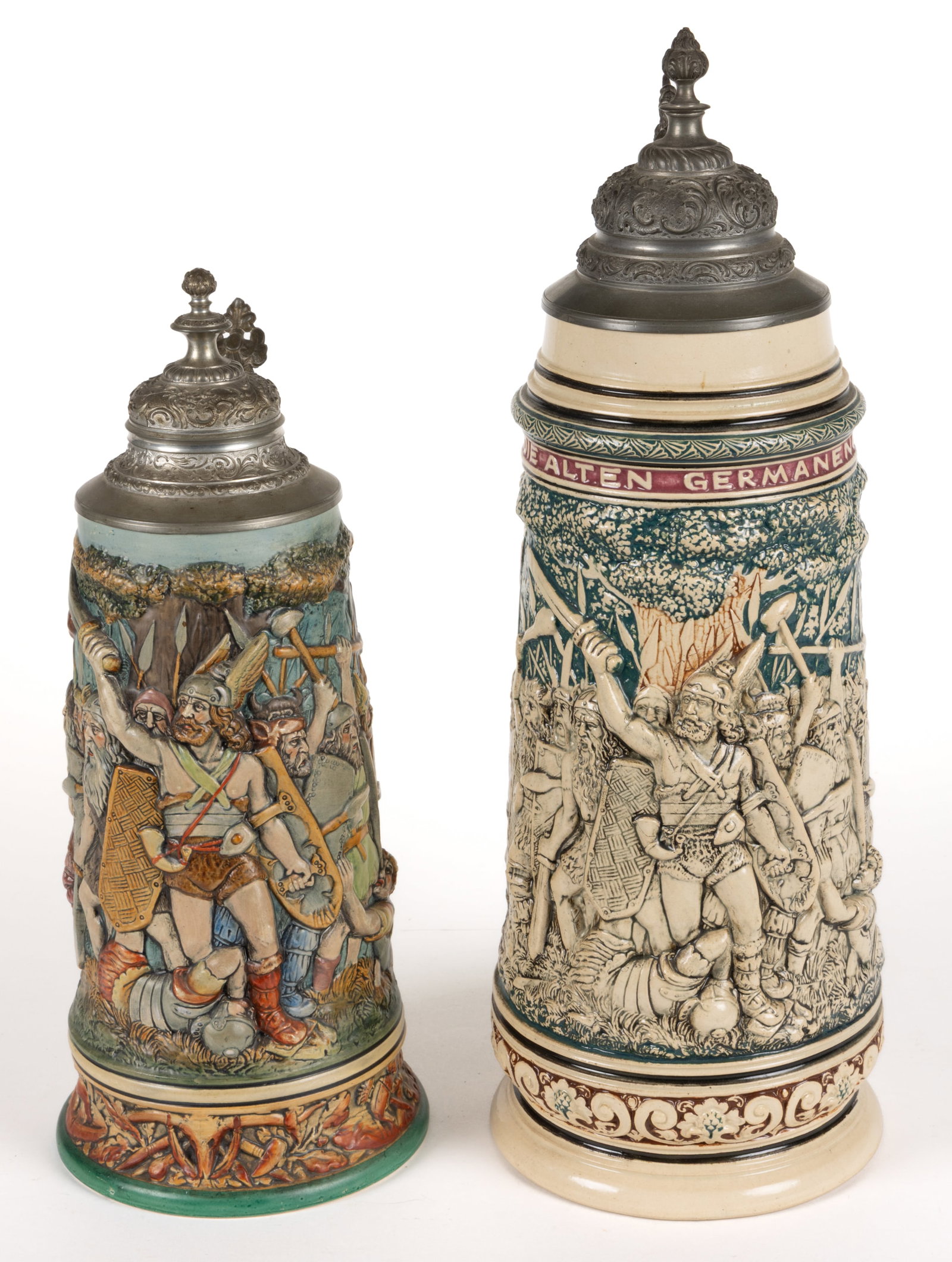 GERMAN J.L. KNOEDGEN ATTRIBUTED RELIEF-DECORATED STONEWARE STEINS, LOT OF TWO (1 of 4)
