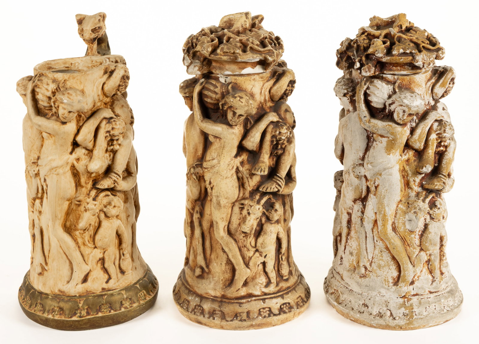 EUROPEAN RELIEF-DECORATED PLASTER STEINS, LOT OF THREE (1 of 3)