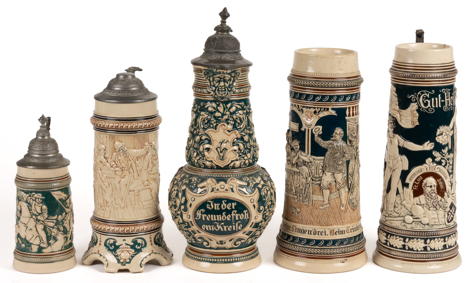 GERMAN RELIEF-DECORATED CERAMIC STEINS, LOT OF FIVE (1 of 3)