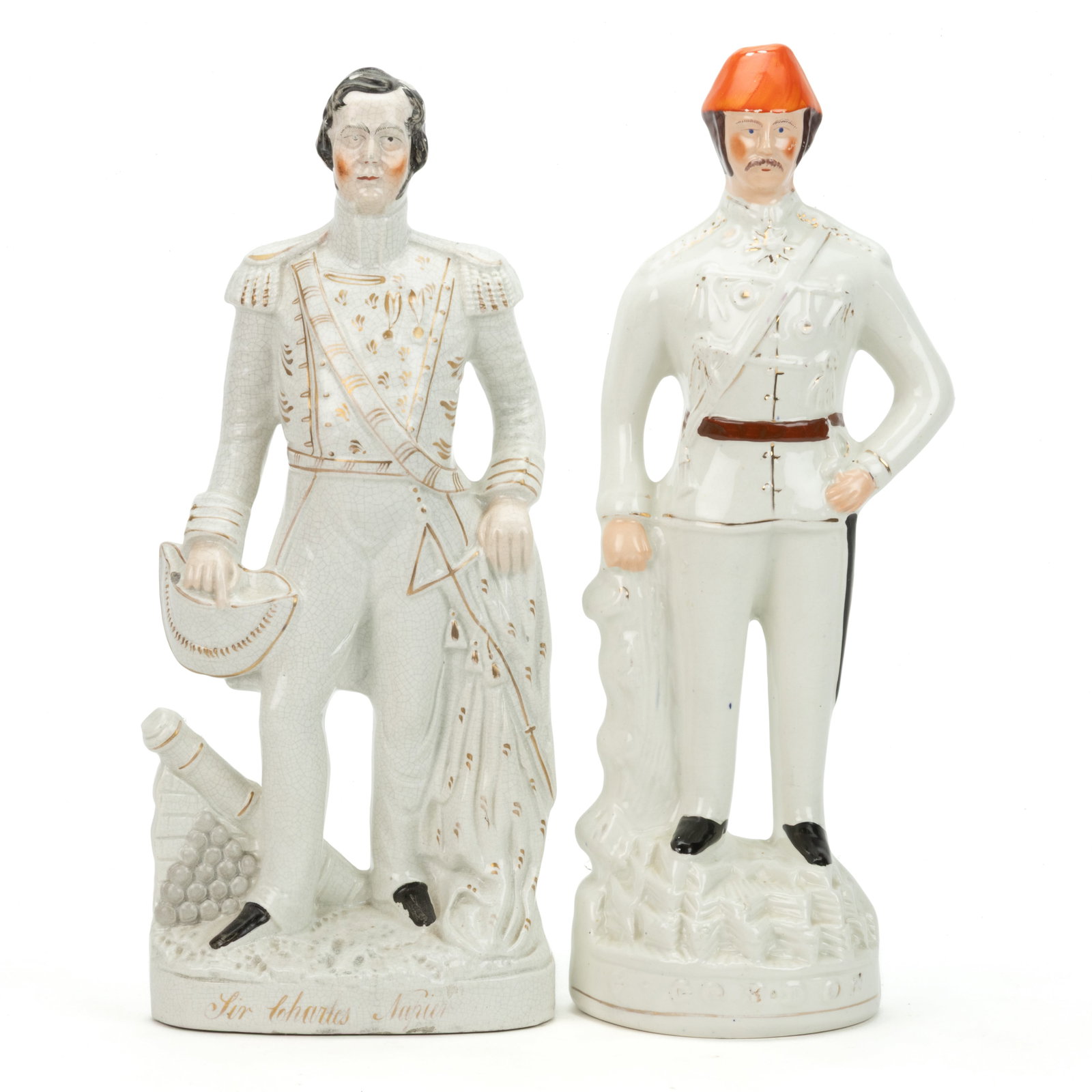 ENGLISH STAFFORDSHIRE HAND-PAINTED CERAMIC MILITARY FIGURES, LOT OF TWO: ENGLISH STAFFORDSHIRE HAND-PAINTED CERAMIC MILITARY FIGURES, LOT OF TWO, each having polychrome enamel and gilt decorations with ovoid bases, comprising one example depicting "Sir Charles Napier&
