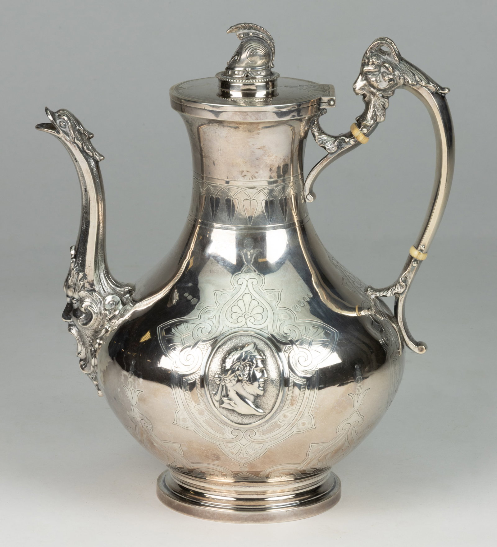 KIDNEY, CANN & JOHNSON, NEW YORK CITY, NEW YORK MEDALLION COIN SILVER COFFEE POT: KIDNEY, CANN & JOHNSON, NEW YORK CITY, NEW YORK MEDALLION COIN SILVER COFFEE POT, bulbous well with tall narrow neck, having engraved and chased decoration including anthemion leaves and geometric