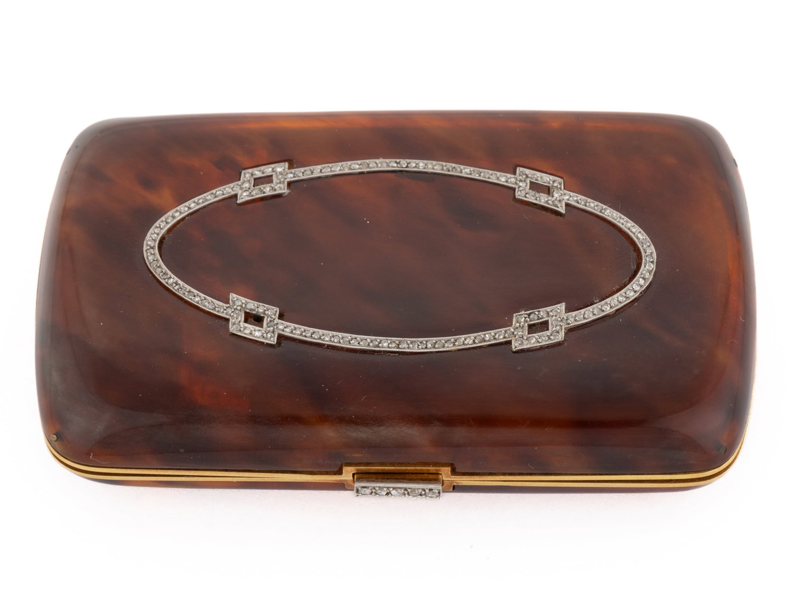 FRENCH 18K YELLOW GOLD, DIAMOND, AND FAUX SHELL LADY'S CIGARETTE CASE: FRENCH 18K YELLOW GOLD, DIAMOND, AND FAUX SHELL LADY'S CIGARETTE CASE, slightly rounded rectangular form with plastic faux shell lid and base, having 18K gold rims, hinge, and reticulated interior