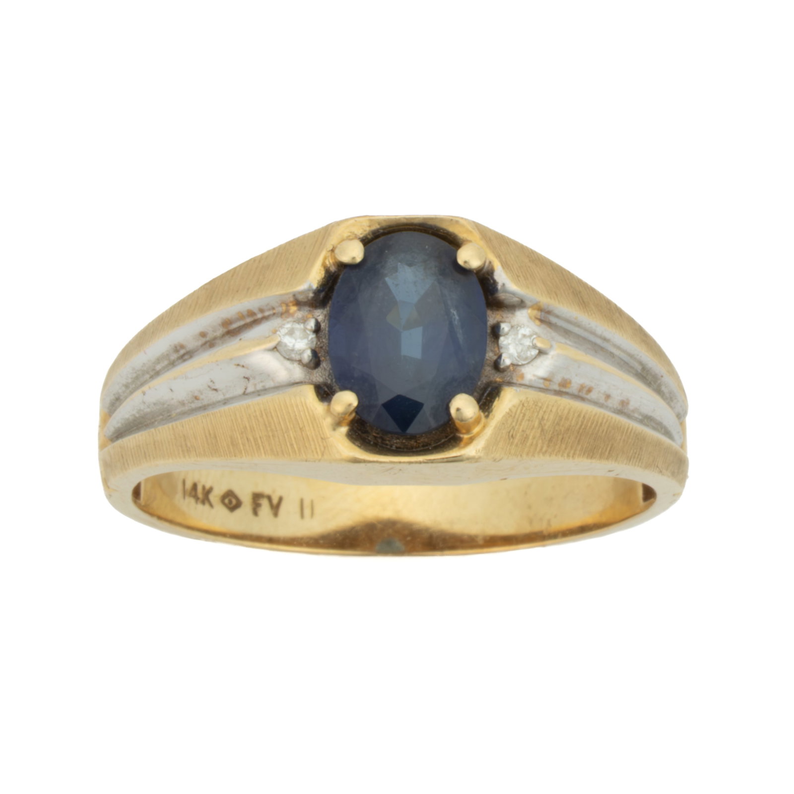 VINTAGE 14K TWO-TONED GOLD, SAPPHIRE, AND DIAMOND MEN'S RING: VINTAGE 14K TWO-TONED GOLD, SAPPHIRE, AND DIAMOND MEN'S RING, having a tapered yellow gold band with white gold shoulders, center set with an oval-cut blue sapphire measuring approximately 8 x 6 m