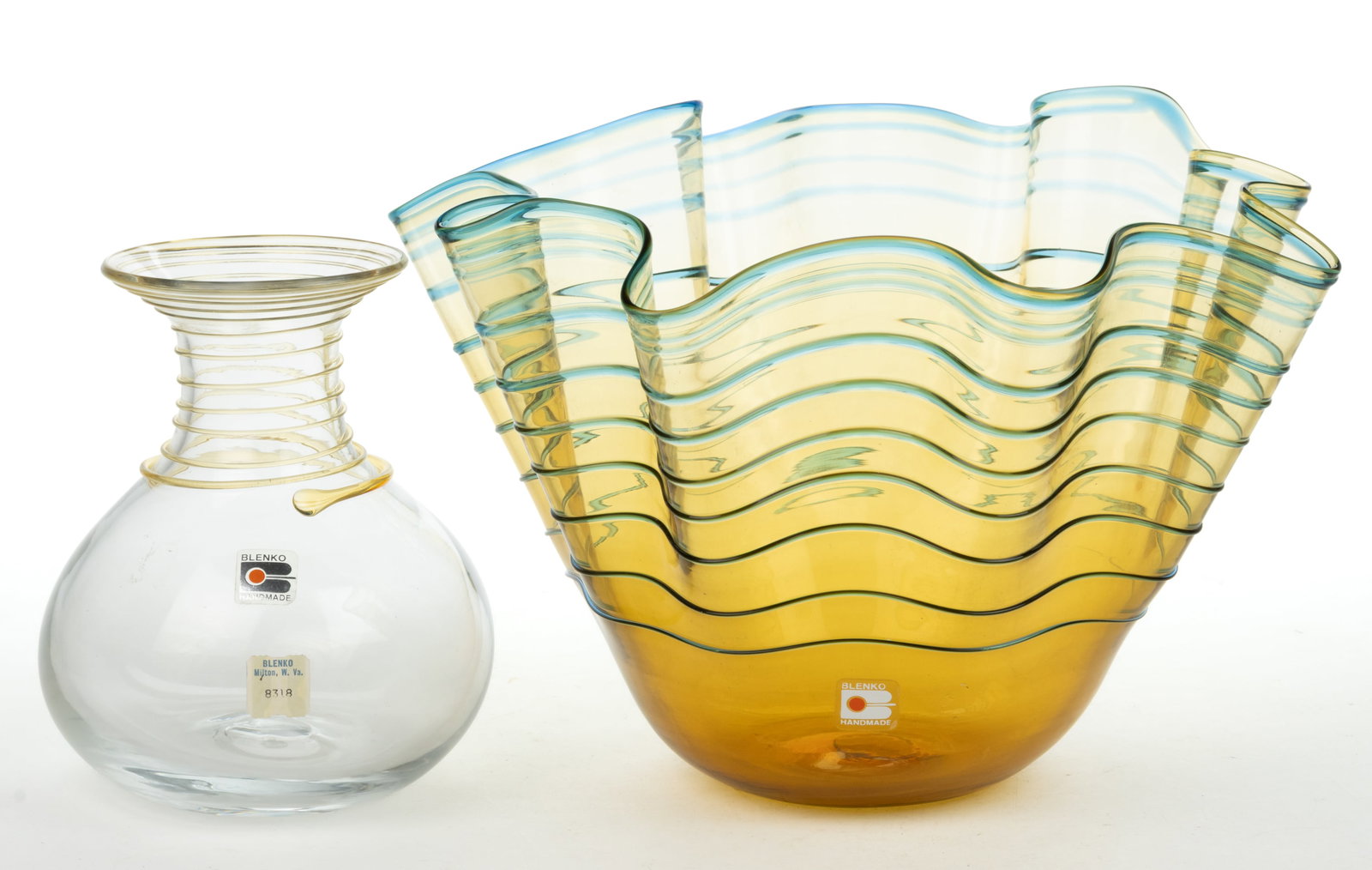 BLENKO GLASS LIMITED EDITION WEST VIRGINIA 1985 BIRTHDAY SERIES BOWL: BLENKO GLASS LIMITED EDITION WEST VIRGINIA 1985 BIRTHDAY SERIES BOWL, amber handkerchief-shaped vase with applied blue rings. Together with a colorless No. 8318 vase with an applied amber sw