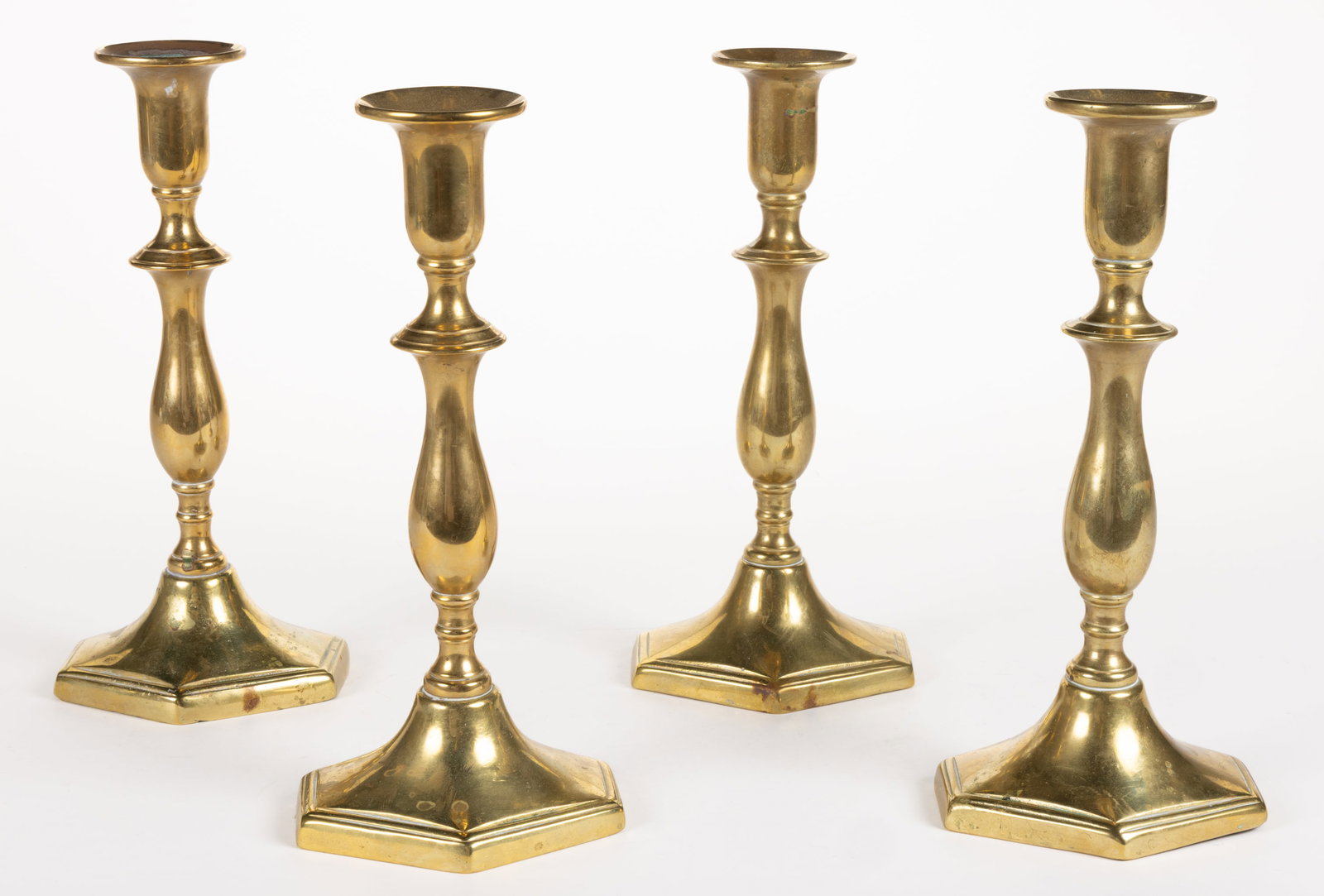 ENGLISH BRASS CANDLESTICKS, SET OF FOUR (1 of 2)