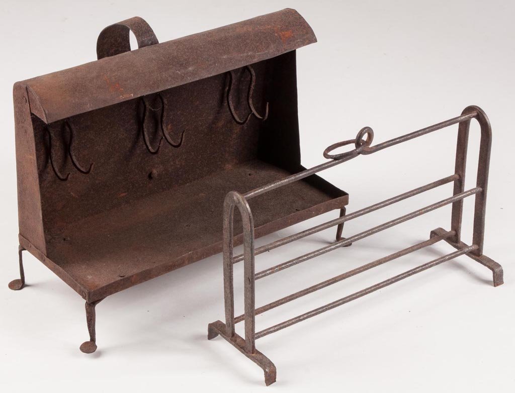 WROUGHT-IRON HEARTH ROASTERS, LOT OF TWO: WROUGHT-IRON HEARTH ROASTERS, LOT OF TWO, comprising an example with a sheet-iron hood and back, strap handle, rectangular drip pan supported by four legs with disk feet, back with six hooks; and an e