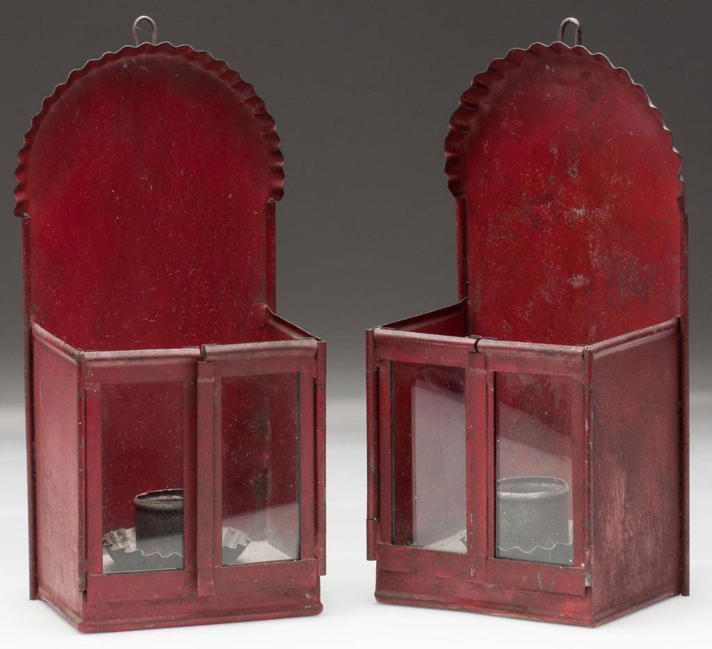 PAINTED SHEET-IRON CANDLE WALL SCONCES, PAIR: PAINTED SHEET-IRON CANDLE WALL SCONCES, PAIR, original red paint, arched top with crimped edge and hook, double-hinged doors with removable colorless glass pane and a single socket. UPDATE 6/19/13 Pro