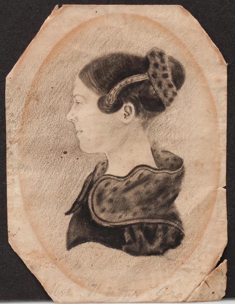 AMERICAN SCHOOL MINIATURE PORTRAIT: AMERICAN SCHOOL MINIATURE PORTRAIT, pencil and charcoal on paper, depicting a young lady in fashionable attire, inscribed "Mrs. Martha Graham" across lower edge with another illegible inscription abov