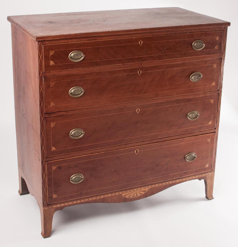 SOUTHERN FEDERAL INLAID CHERRY CHEST OF DRAWERS: SOUTHERN FEDERAL INLAID CHERRY CHEST OF DRAWERS, four graduated drawers with shield-form escutcheons above a shaped skirt and slightly flared feet. Top with inlaid quarter-fans to front corners, strin