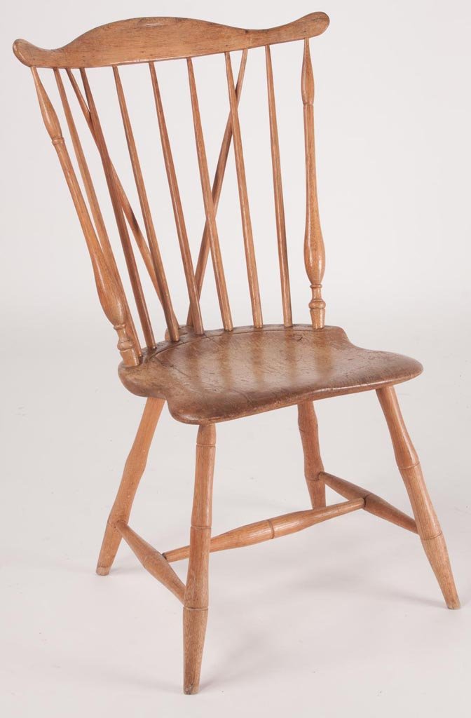 MID-ATLANTIC BRACE-BACK WINDSOR SIDE CHAIR: MID-ATLANTIC BRACE-BACK WINDSOR SIDE CHAIR, shaped crest above seven spindles and a shaped seat, raised on bamboo-turned legs. Possibly Shenandoah Valley of Virginia. Early 19th century. 35" HOA, 17" 