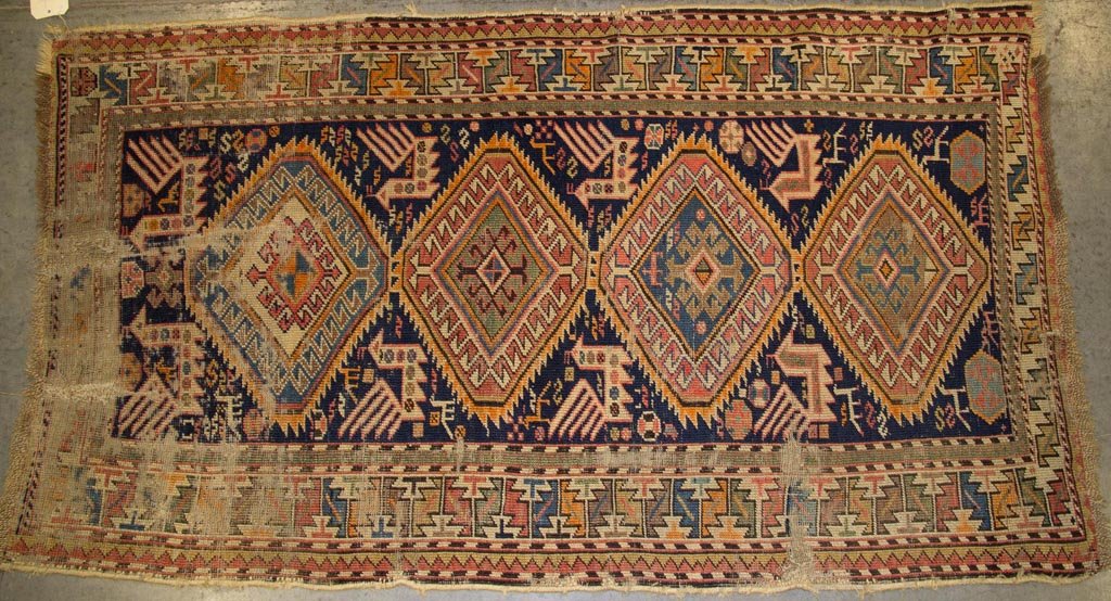 ANTIQUE ORIENTAL RUGS, LOT OF TWO: ANTIQUE ORIENTAL RUGS, LOT OF TWO, comprising a scatter and a runner, each with a geometric pattern on a blue field. First half 20th century. 3' 3" x 5' 9" and 2' 6" x 15' 6". Provenance: The estate c