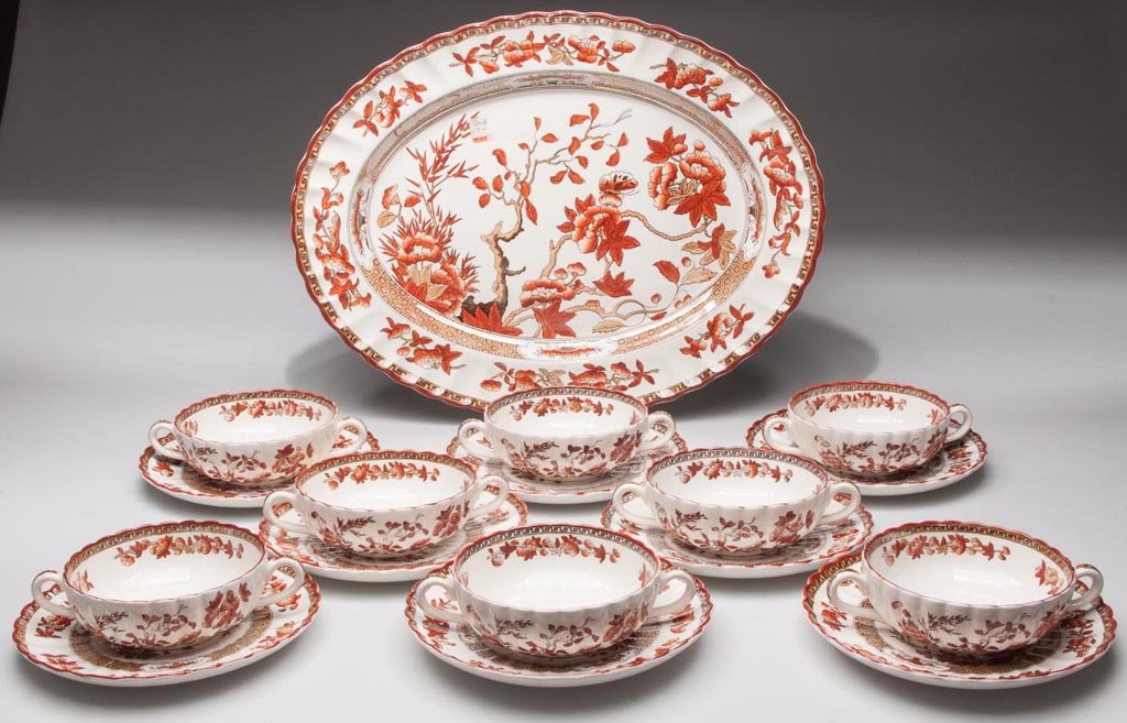 "INDIA TREE" COPELAND SPODE CREAM-COLORED IRONSTONE: INDIA TREE COPELAND SPODE CREAM-COLORED IRONSTONE ARTICLES, LOT OF 17, comprising eight broth bowls with saucers and a platter, each with fluted borders, the pattern transfer-printed in iron-red, blac