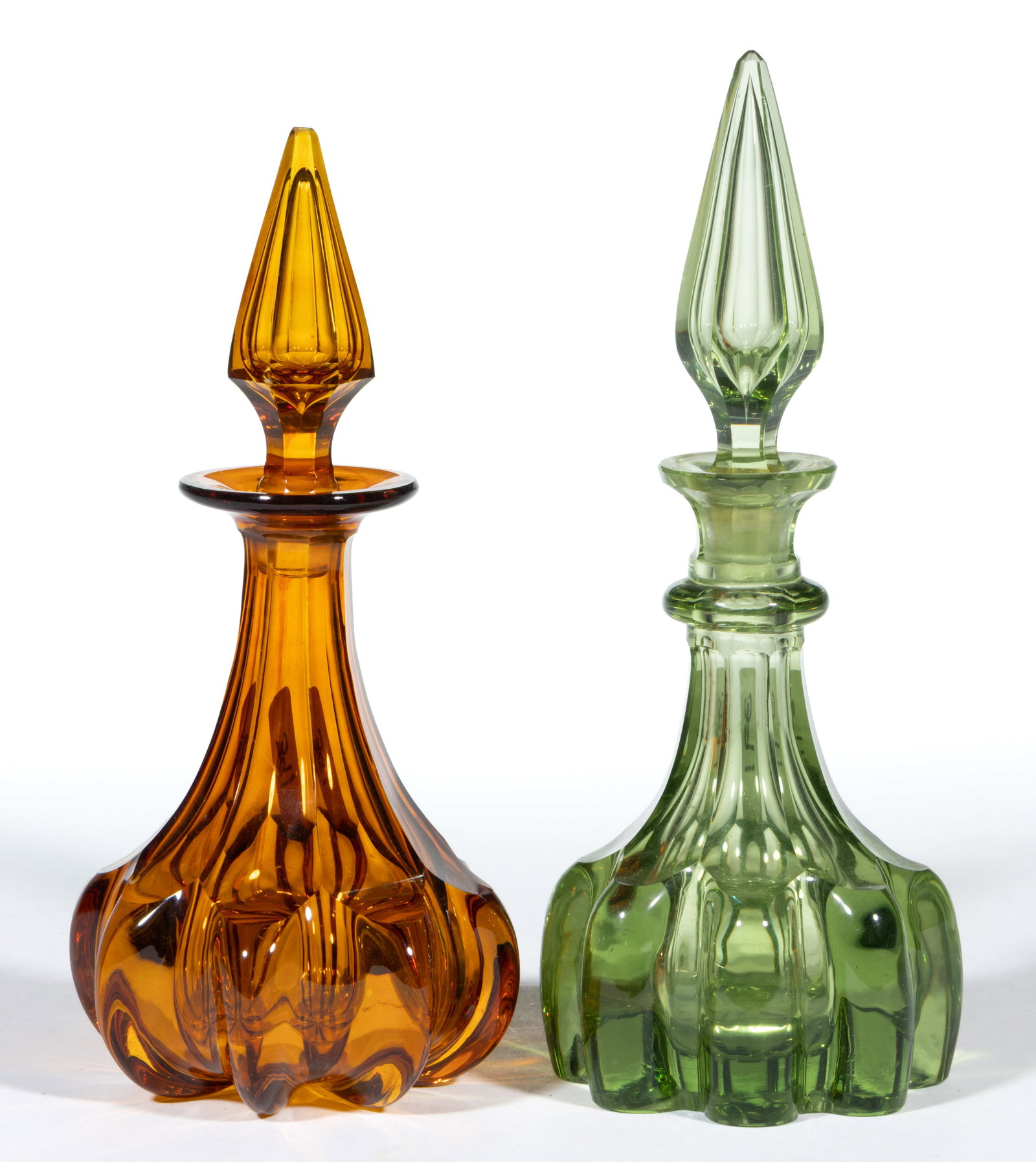 ASSORTED PANELED COLOGNE BOTTLES, LOT OF TWO: ASSORTED PANELED COLOGNE BOTTLES, LOT OF TWO, amber and lime green, comprising an amber globular bottle with eight ribs around the body that meets with panel-cut neck and factory-polished lip with
