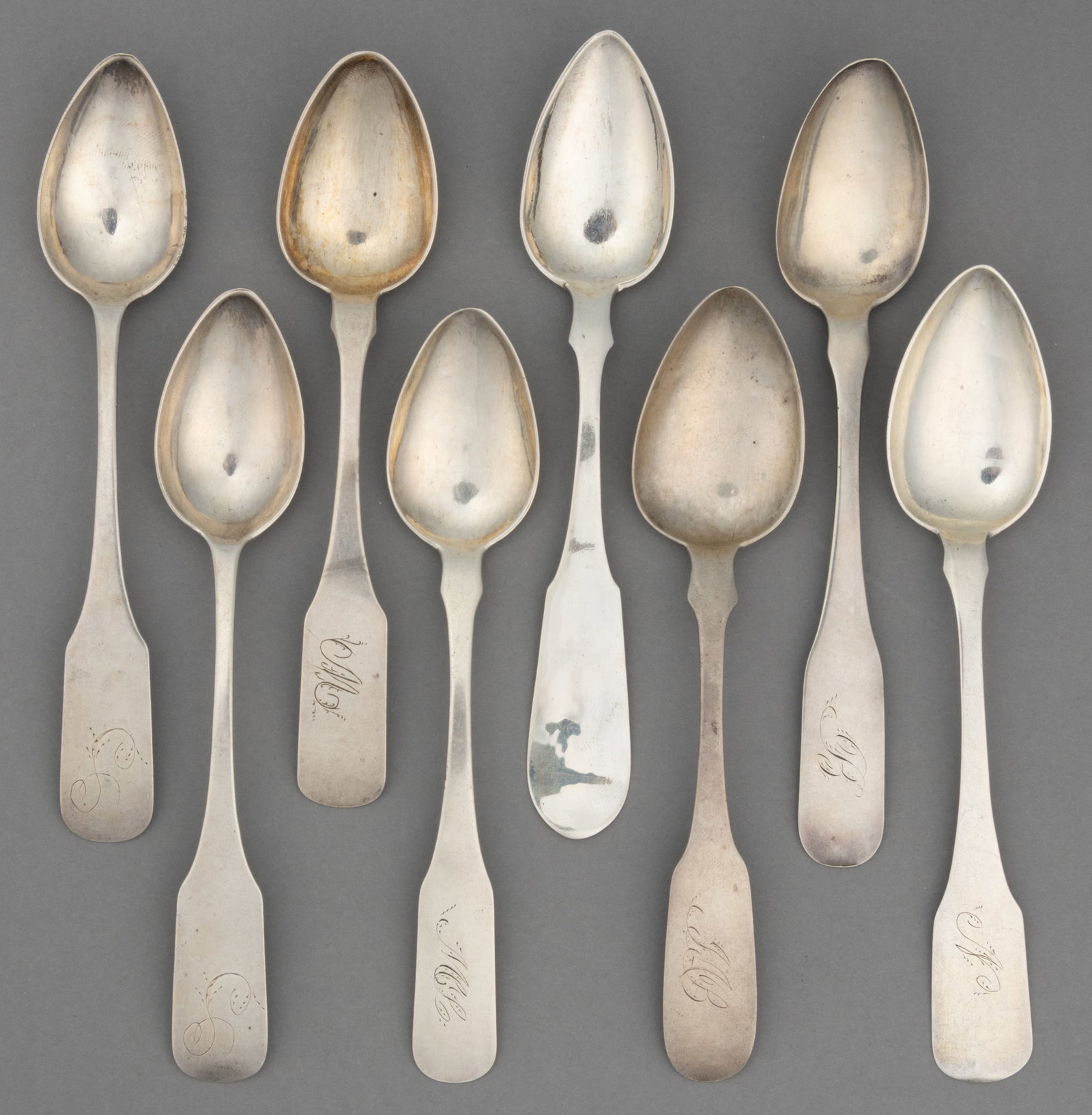WINCHESTER, SHENANDOAH VALLEY OF VIRGINIA COIN SILVER TEASPOONS, LOT OF EIGHT: WINCHESTER, SHENANDOAH VALLEY OF VIRGINIA COIN SILVER TEASPOONS, LOT OF EIGHT, each having a pointed bowl on a fiddle handle, most with pointed shoulders and/or a personalized engraving; comprising on