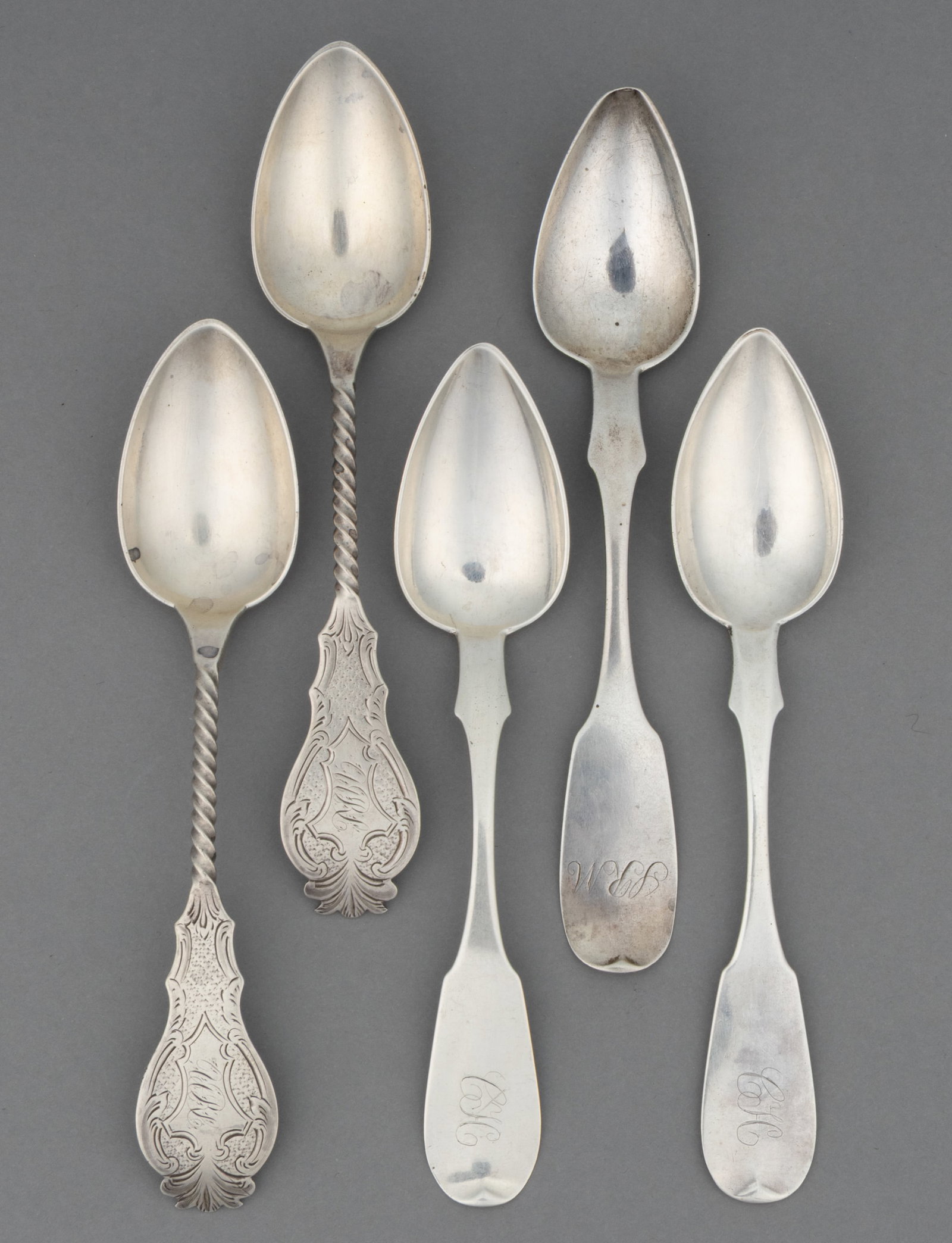 FREDERICK J. POSEY, HAGERSTOWN, MARYLAND / (WEST) VIRGINIA MADE / RETAILED COIN SILVER TEASPOONS,: FREDERICK J. POSEY, HAGERSTOWN, MARYLAND / (WEST) VIRGINIA MADE / RETAILED COIN SILVER TEASPOONS, LOT OF FIVE, each piece having a personalized engraving to handle; comprising three with forward-tippe