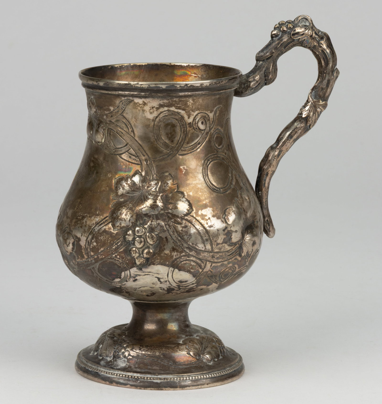 STEBBINS & CO., NEW YORK CITY, NEW YORK REPOUSSE COIN SILVER MUG (1 of 2)