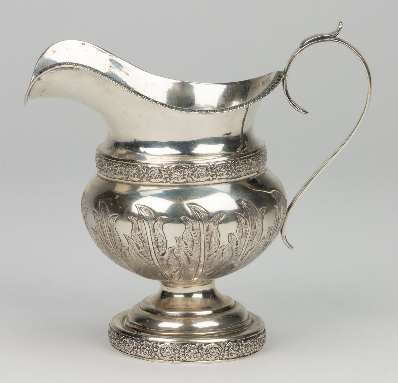 AMERICAN CHASED COIN SILVER CREAMER (1 of 2)