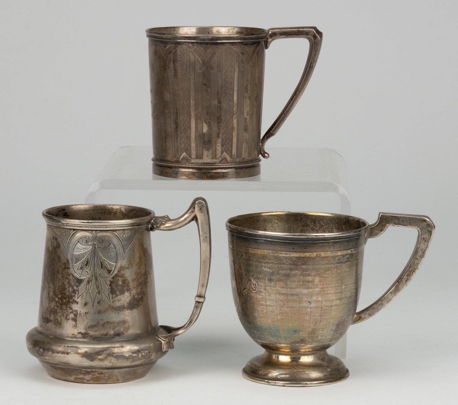 AMERICAN ENGRAVED-DECORATED COIN SILVER MUGS, LOT OF THREE (1 of 3)