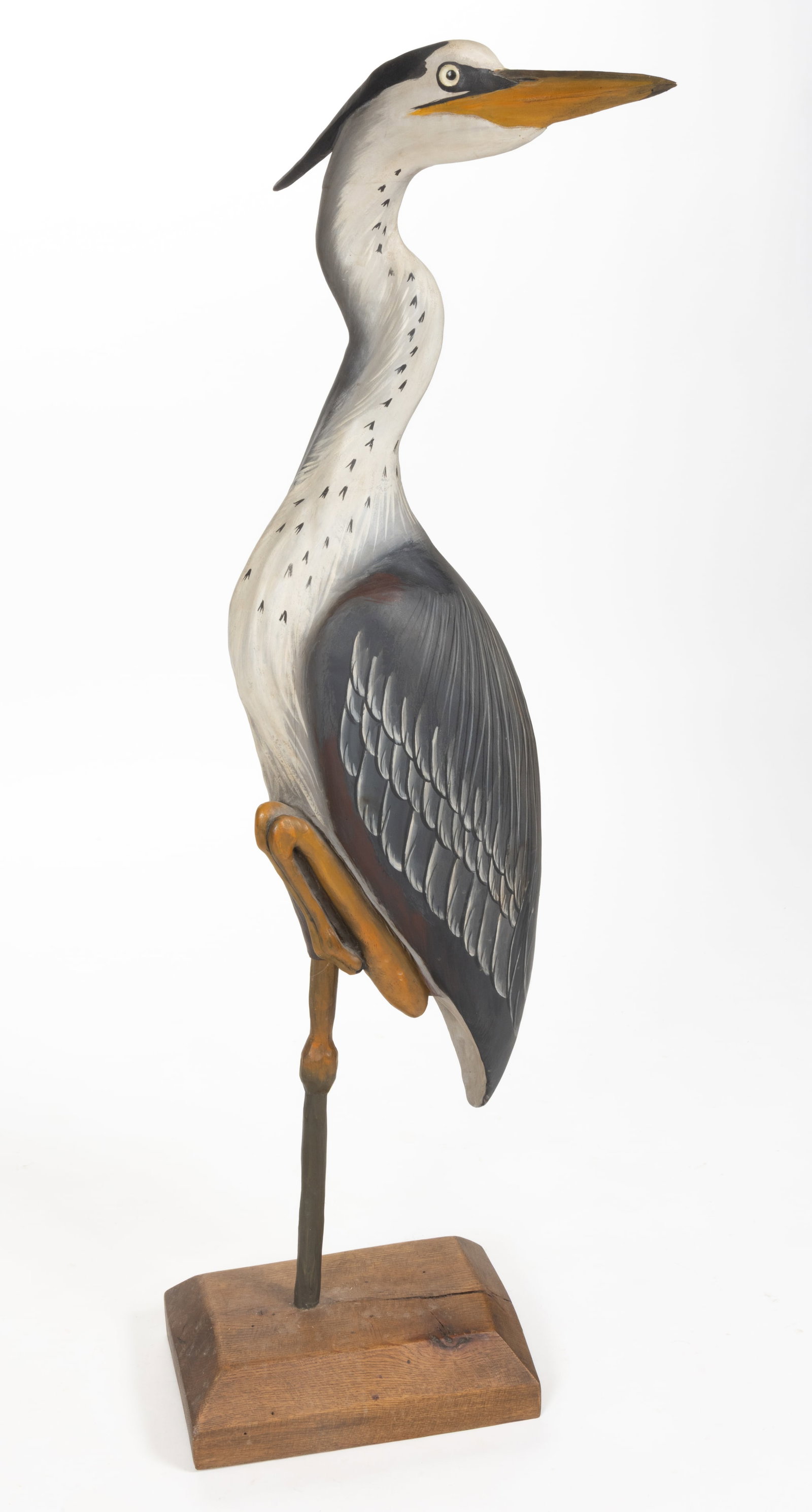 ROBERT "BOB" MORELAND (VIRGINIA, 20TH / 21ST CENTURY) CARVED AND PAINTED LIFE-SIZED GREAT BLUE HERON: ROBERT "BOB" MORELAND (VIRGINIA, 20TH / 21ST CENTURY) CARVED AND PAINTED LIFE-SIZED GREAT BLUE HERON, standing on one leg with inset glass eyes, dagger-like bill, and finely painte