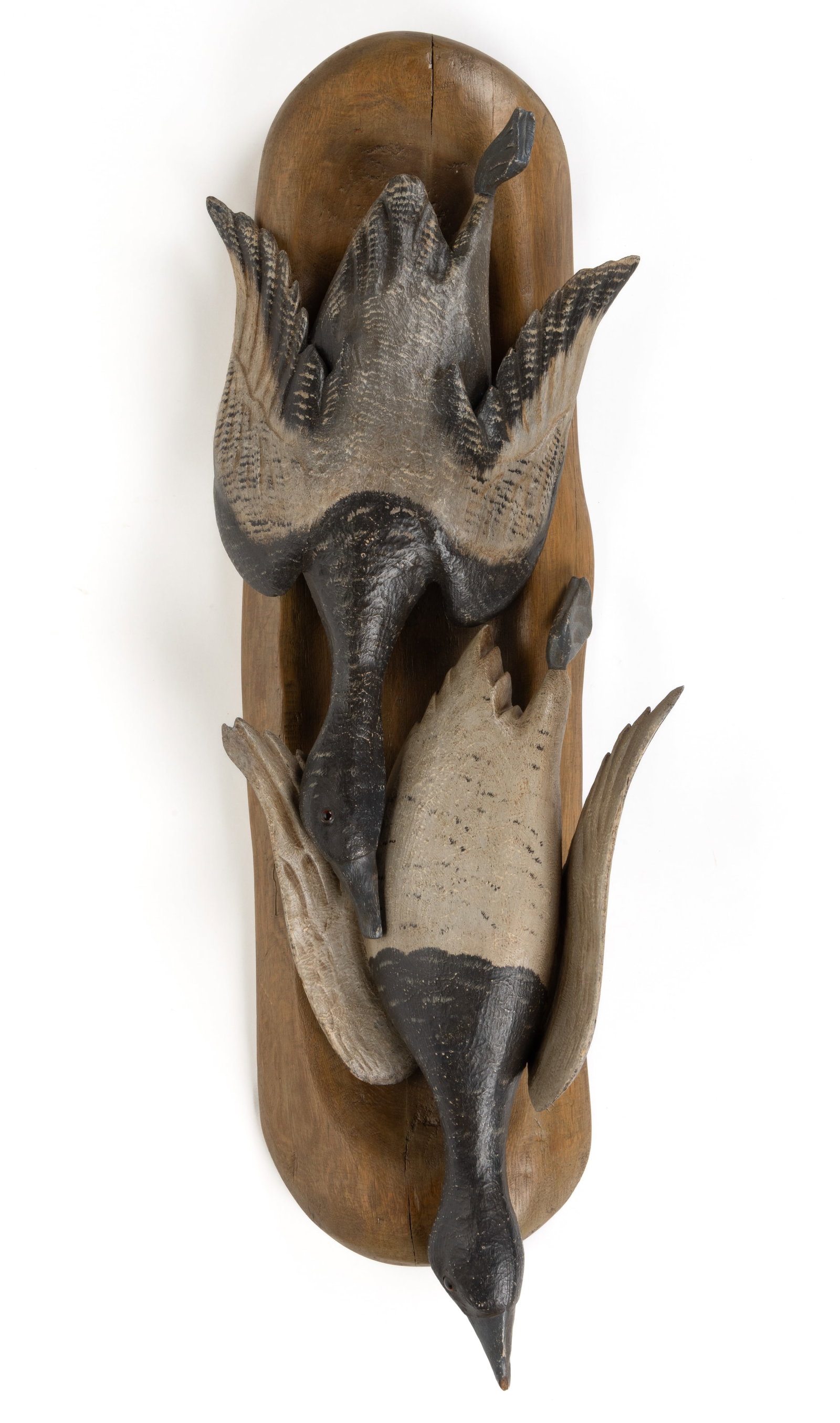 CASEY EDWARDS (WISCONSIN, 20TH/21ST CENTURY) SPORTING / WILDLIFE CARVING: CASEY EDWARDS (WISCONSIN, 20TH/21ST CENTURY) SPORTING / WILDLIFE CARVING, a nature d'mort-style example with two ducks carved from the solid and applied to a naturalistic wooden mounting boar