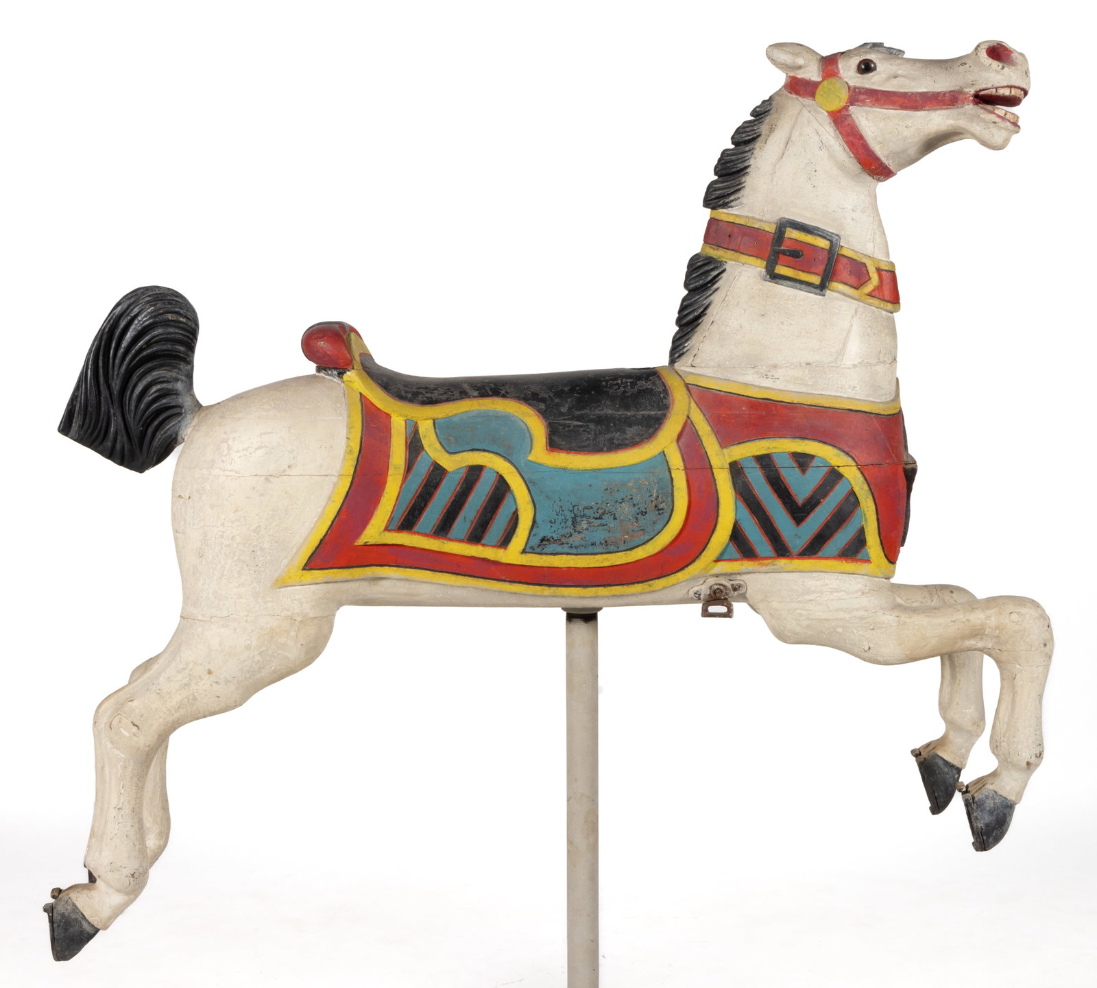 CHARLES W. PARKER (ABILENE AND LEAVENWORTH, KS, 1864-1932), ATTRIBUTED, FOLK ART CARVED AND PAINTED: CHARLES W. PARKER (ABILENE AND LEAVENWORTH, KS, 1864-1932), ATTRIBUTED, FOLK ART CARVED AND PAINTED CAROUSEL HORSE, a second-row jumper form with glass eyes, wooden tail, and star to chest, retaining 