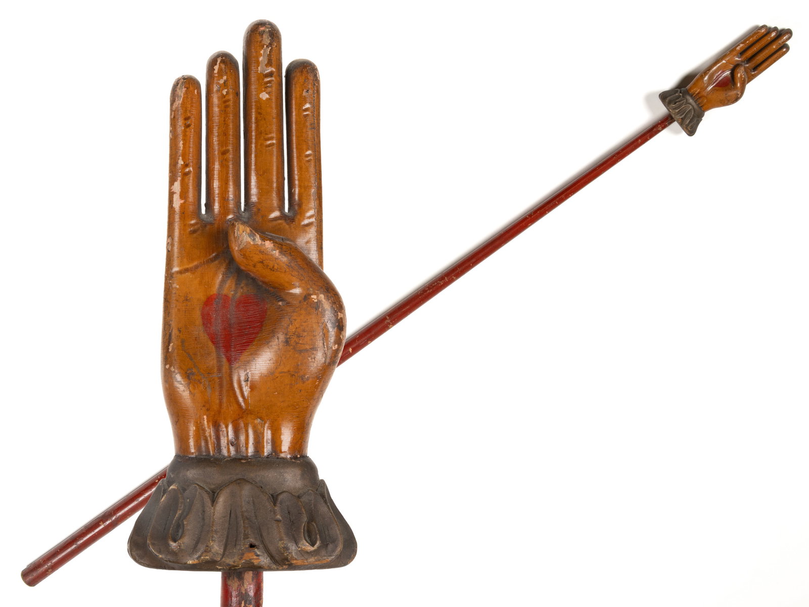AMERICAN FOLK ART CARVED AND PAINTED WOODEN ODD FELLOWS HEART-IN-HAND CEREMONIAL LODGE STAFF: AMERICAN FOLK ART CARVED AND PAINTED WOODEN ODD FELLOWS HEART-IN-HAND CEREMONIAL LODGE STAFF, a fine example with slender hand and stylized cuff, retaining original polychrome surface. 