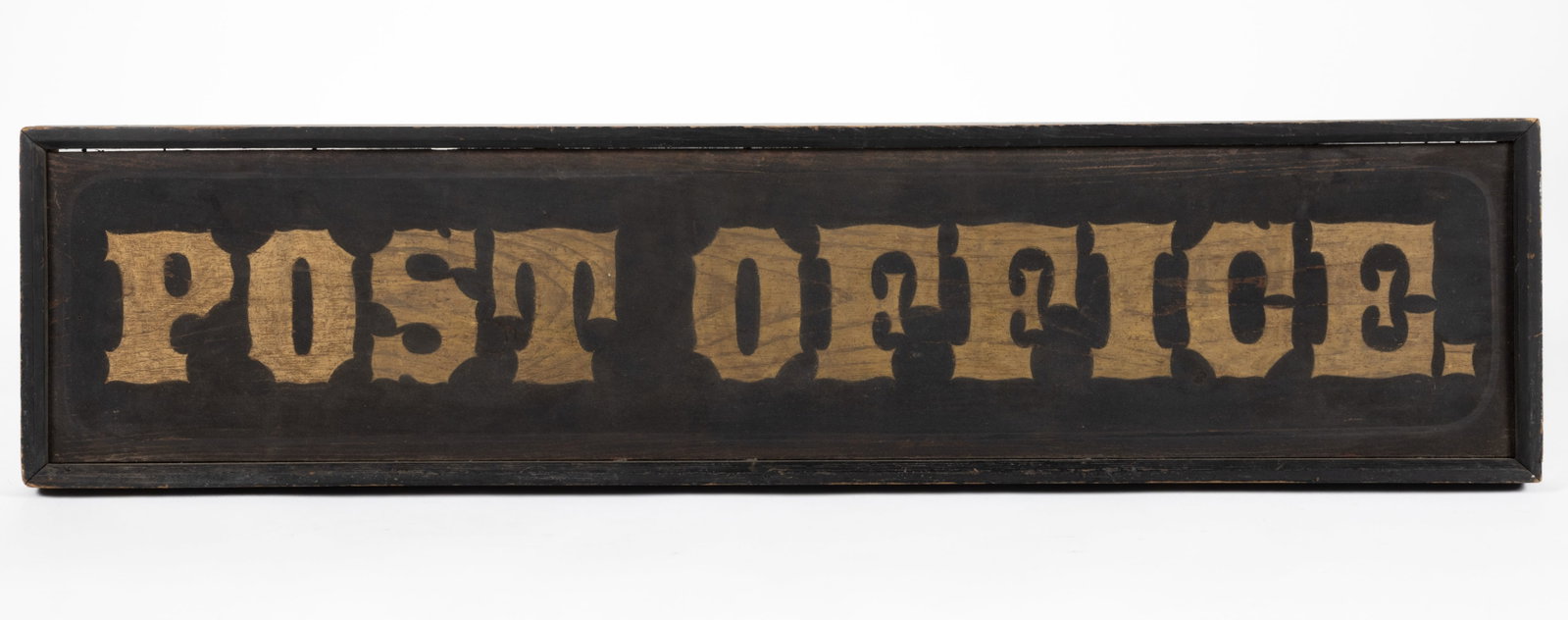 AMERICAN FOLK ART PAINTED PINE POST OFFICE TRADE SIGN: AMERICAN FOLK ART PAINTED PINE POST OFFICE TRADE SIGN, rectangular single-sided form with gold letters against a black schmaltz ground, all within an applied molded border, retaining original surface.