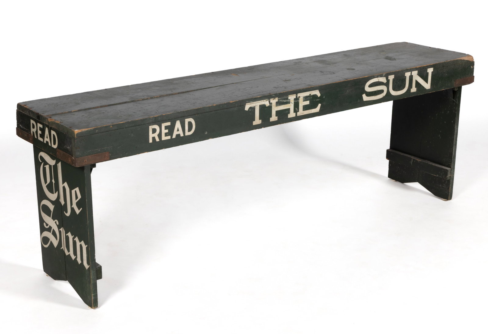 AMERICAN PAINT-DECORATED WOODEN "THE SUN" NEWSPAPER ADVERTISING BENCH WITH FOLDING LEGS: AMERICAN PAINT-DECORATED WOODEN "THE SUN" NEWSPAPER ADVERTISING BENCH WITH FOLDING LEGS, rectangular form, dropped sides with white painted text "READ THE SUN" on each si