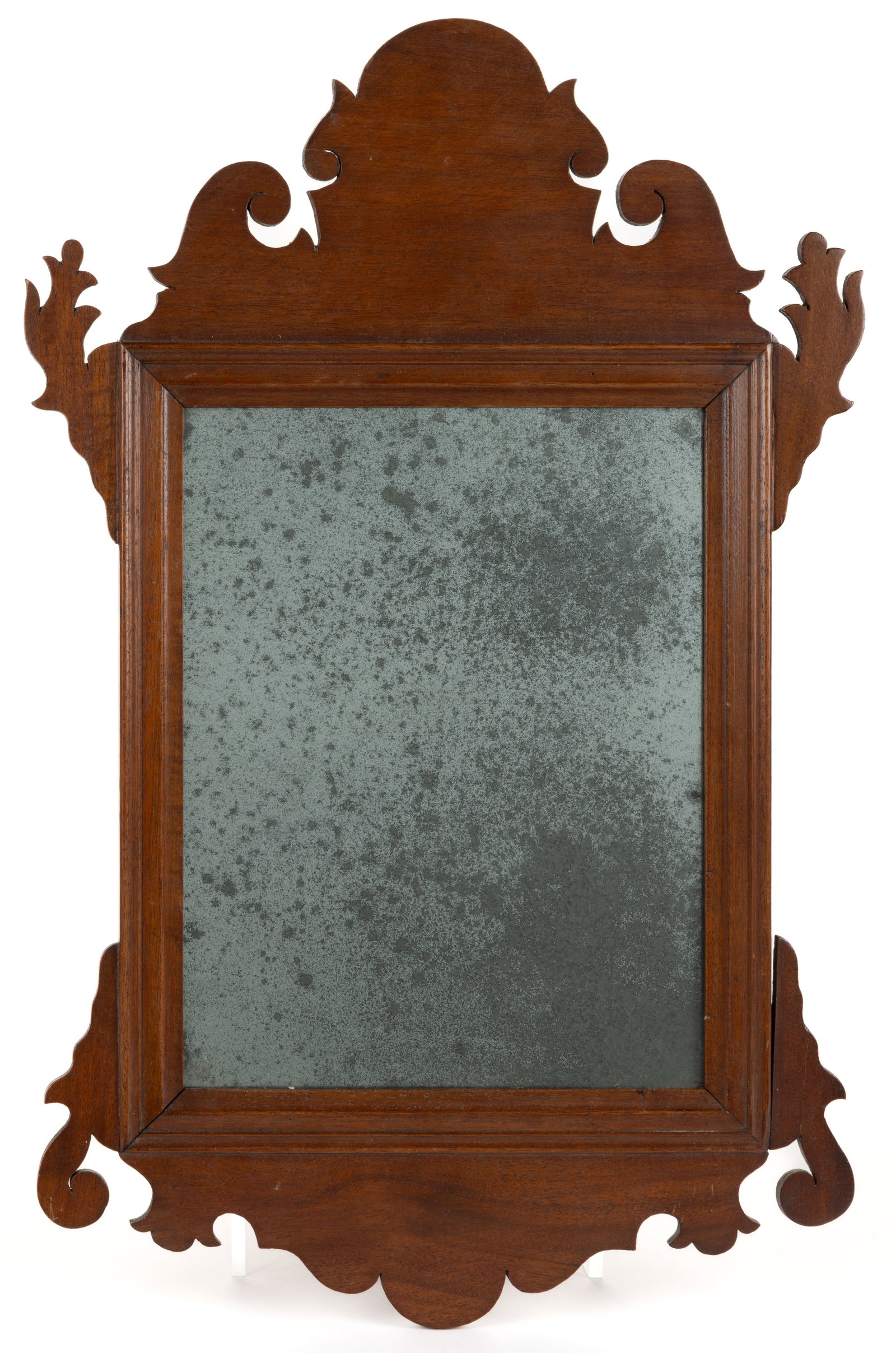 AMERICAN, POSSIBLY EAST TENNESSEE, CHIPPENDALE MAHOGANY WALL MIRROR: AMERICAN, POSSIBLY EAST TENNESSEE, CHIPPENDALE MAHOGANY WALL MIRROR, a fine example of diminutive size, featuring elaborate cut-out scroll work applied to a molded rectangular frame.