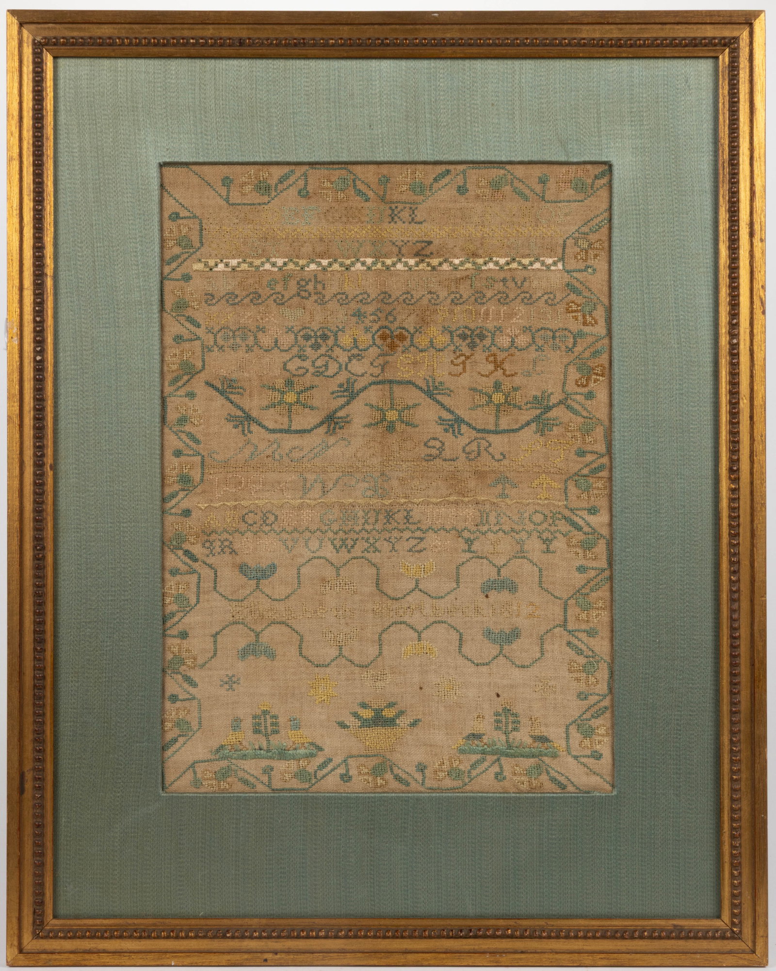 CHARLESTON, SOUTH CAROLINA NEEDLEWORK SAMPLER: CHARLESTON, SOUTH CAROLINA NEEDLEWORK SAMPLER, silk on linen, nine alphabet and numeral rows segmented by horizontal bands of decorative stitching including two foliate vines, lower third with