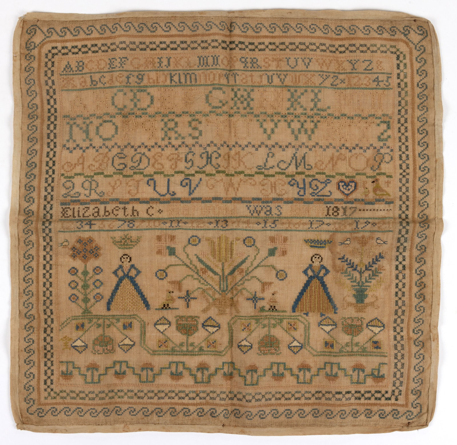 BRITISH PICTORIAL NEEDLEWORK SAMPLER: BRITISH PICTORIAL NEEDLEWORK SAMPLER, silk on linen, upper half with rows segmented by horizontal bands of decorative stitching, consisting of six alphabet rows with numerals at the end of the second