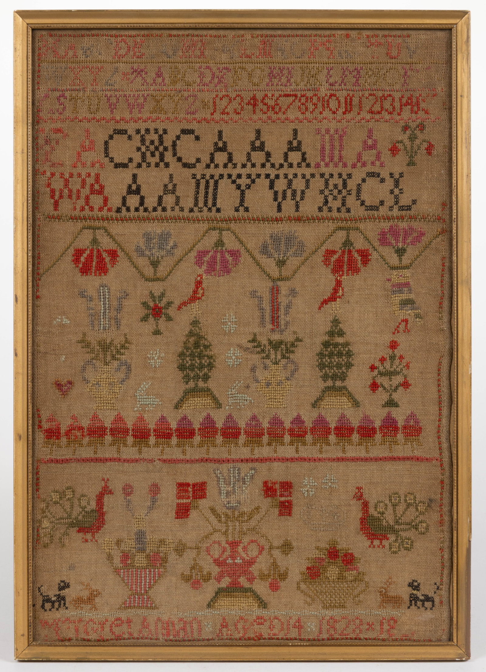 SCOTTISH PICTORIAL NEEDLEWORK SAMPLER: SCOTTISH PICTORIAL NEEDLEWORK SAMPLER, wool, and possibly other thread, on linen, three alphabet and numeral rows segmented by horizontal bands of decorative stitching, below with two rows of