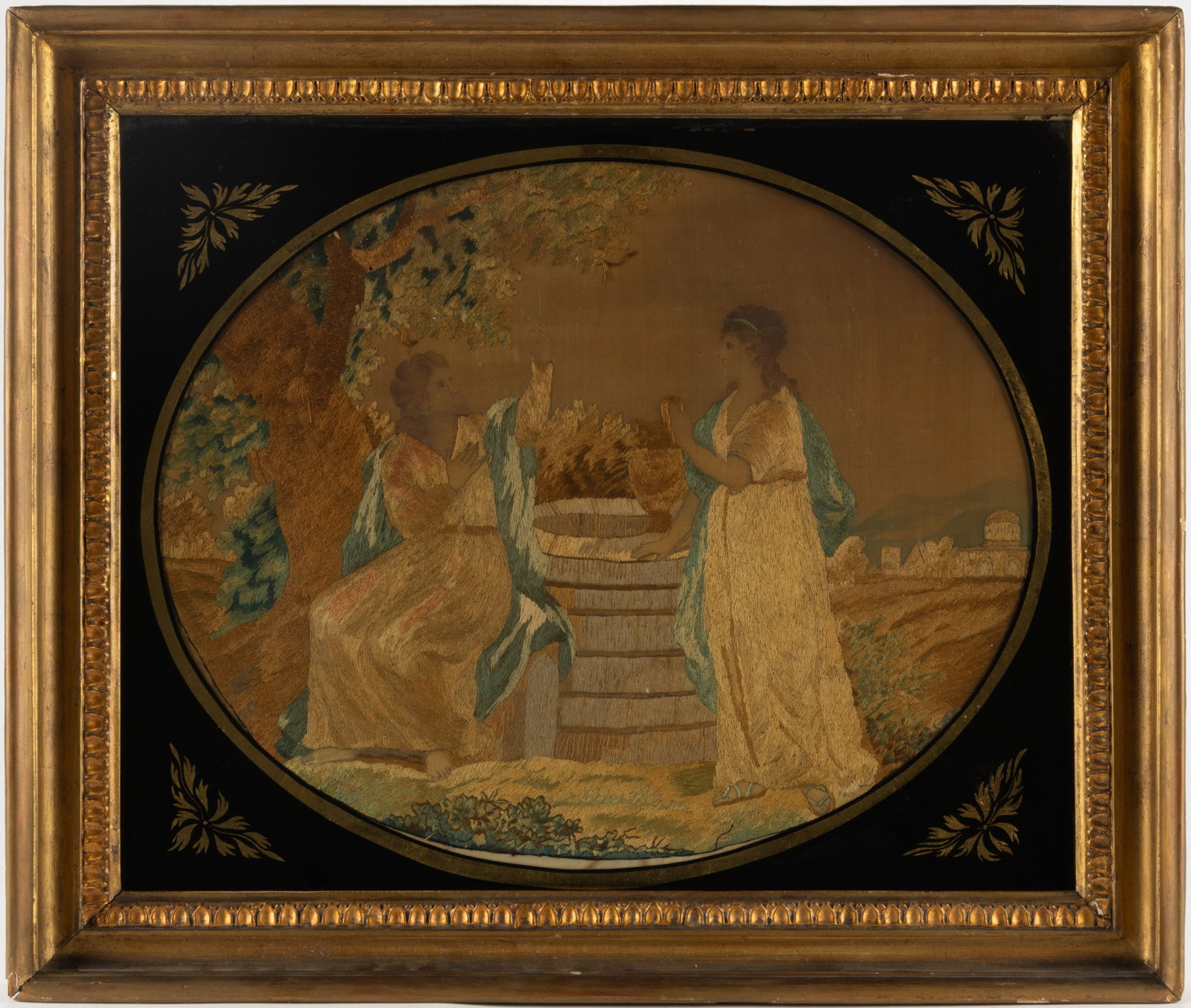 AMERICAN / BRITISH SILK-EMBROIDERED NEEDLEWORK BIBLICAL PICTURE: AMERICAN / BRITISH SILK-EMBROIDERED NEEDLEWORK BIBLICAL PICTURE, silk, paint, and pencil on silk with linen backing, depicting Jesus and the Samaritan woman at Jacob's well from John chapter 4,