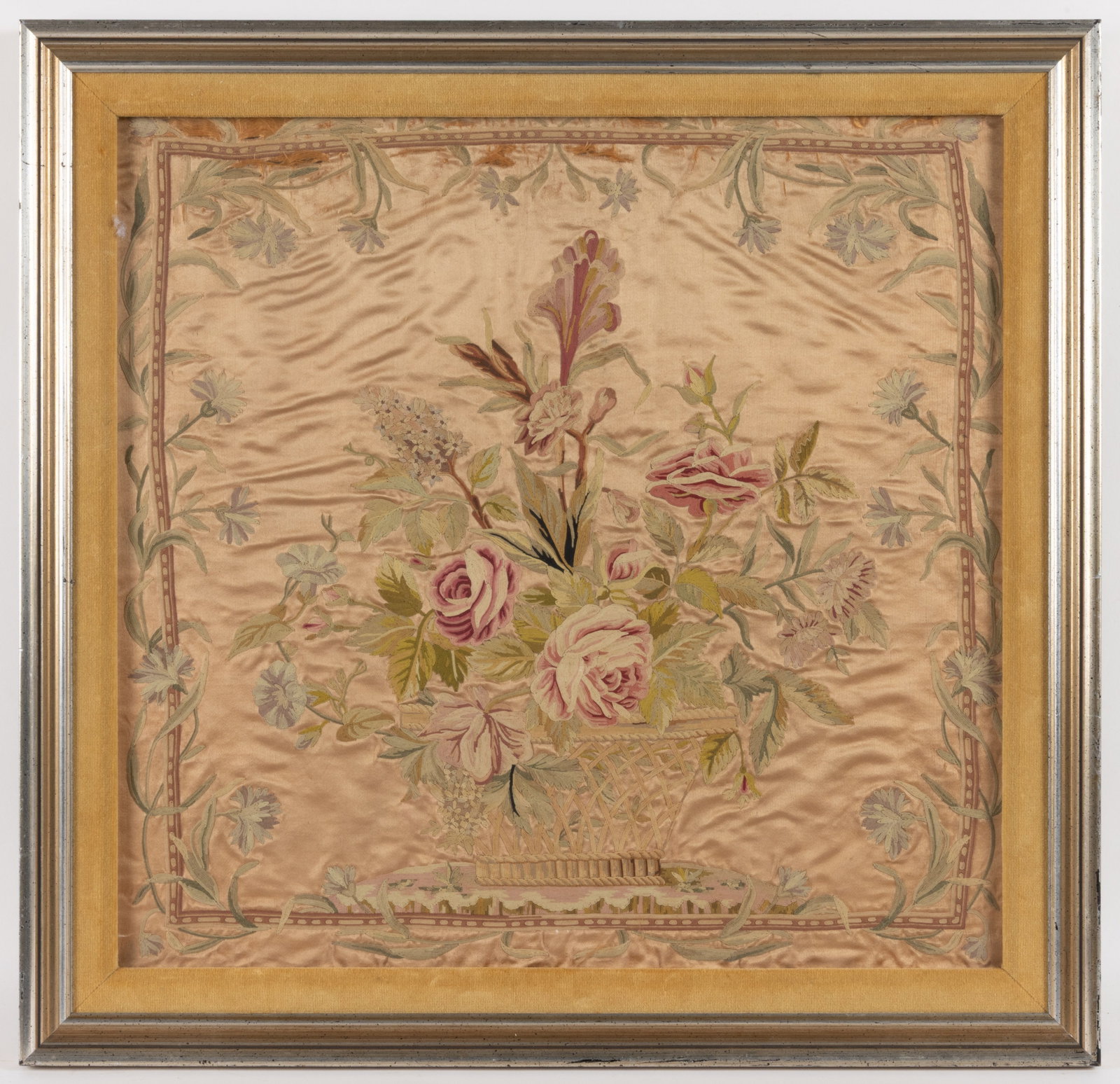 19TH CENTURY SILK-EMBROIDERED BASKET OF FLOWERS NEEDLEWORK PICTURE: 19TH CENTURY SILK-EMBROIDERED BASKET OF FLOWERS NEEDLEWORK PICTURE, silk on silk, completed in very fine chain stitches, featuring a large center basket of various flowers, surrounded by flowers
