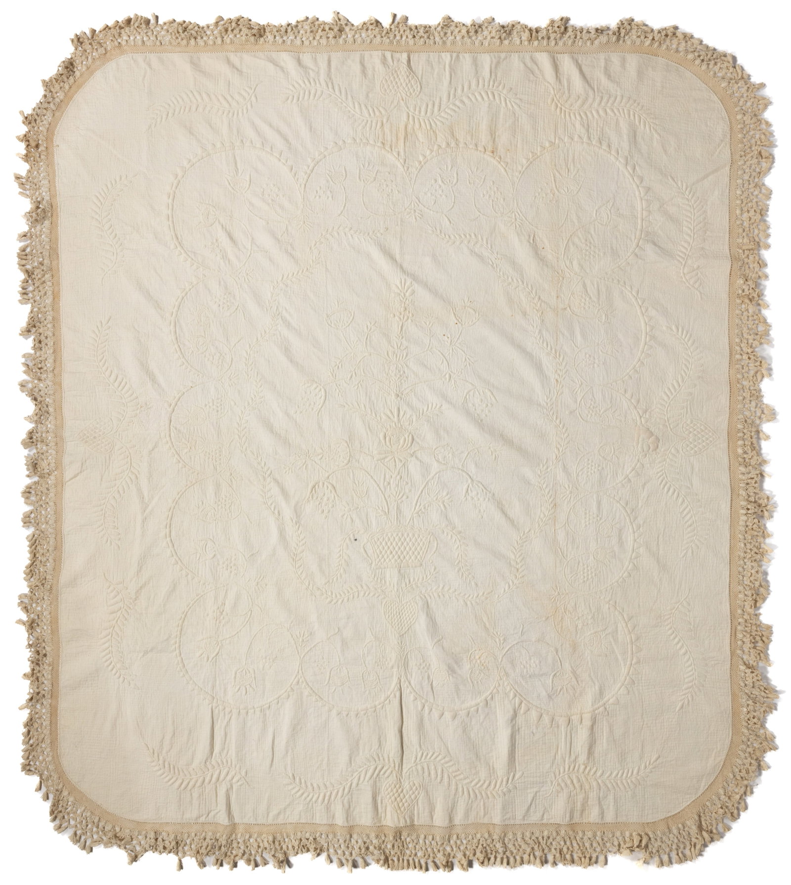 AMERICAN, POSSIBLY VIRGINIA, TRAPUNTO WHITEWORK QUILT: AMERICAN, POSSIBLY VIRGINIA, TRAPUNTO WHITEWORK QUILT, hand-stitched, top with three joined panels having quilted and stuffed stylized designs, featuring a central basket of flowers above a heart and
