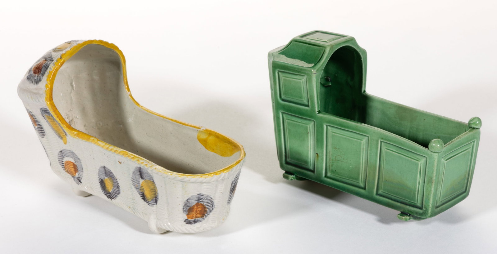 ENGLISH HAND-PAINTED CERAMIC FIGURAL CRADLES, LOT OF TWO (1 of 4)