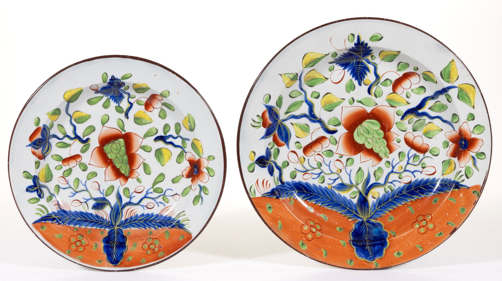 ENGLISH PEARLWARE HAND-PAINTED GAUDY DUTCH CERAMIC PLATES, LOT OF TWO: ENGLISH PEARLWARE HAND-PAINTED GAUDY DUTCH CERAMIC PLATES, LOT OF TWO, each having bold polychrome Dove pattern floral decorations. Impressed marks include "5" and "8" to back