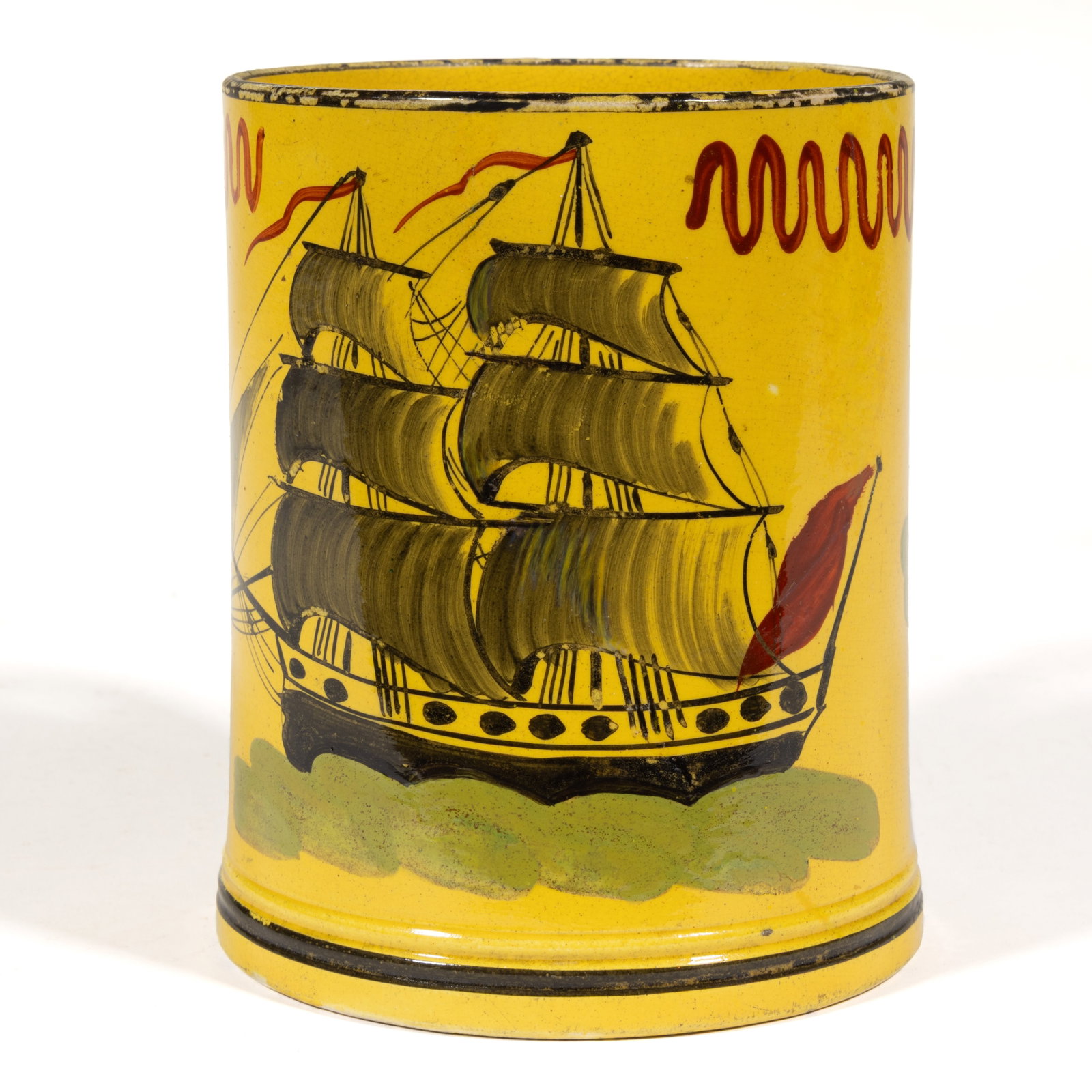 BRITISH CANARY YELLOW HAND-PAINTED SHIP MOTIF CERAMIC TANKARD: BRITISH CANARY YELLOW HAND-PAINTED SHIP MOTIF CERAMIC TANKARD, having a dark polychrome image of a fully rigged ship flanked by roses. Unmarked. First quarter 19th century. 5 1/4" H, 4 
