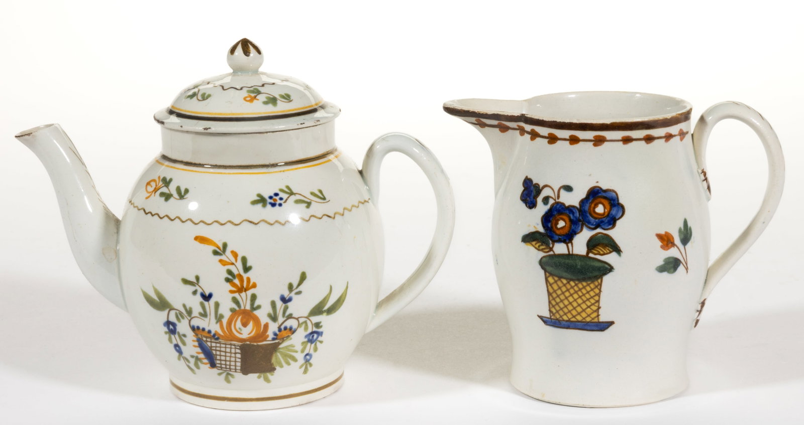 BRITISH PEARLWARE HAND-PAINTED CERAMIC FLORAL MOTIF CHILDREN'S TEA / DRINKING ARTICLES, LOT OF TWO: BRITISH PEARLWARE HAND-PAINTED CERAMIC FLORAL MOTIF CHILDREN'S TEA / DRINKING ARTICLES, LOT OF TWO, each having polychrome floral basket designs, comprising a bulbous-form teapot and a balust