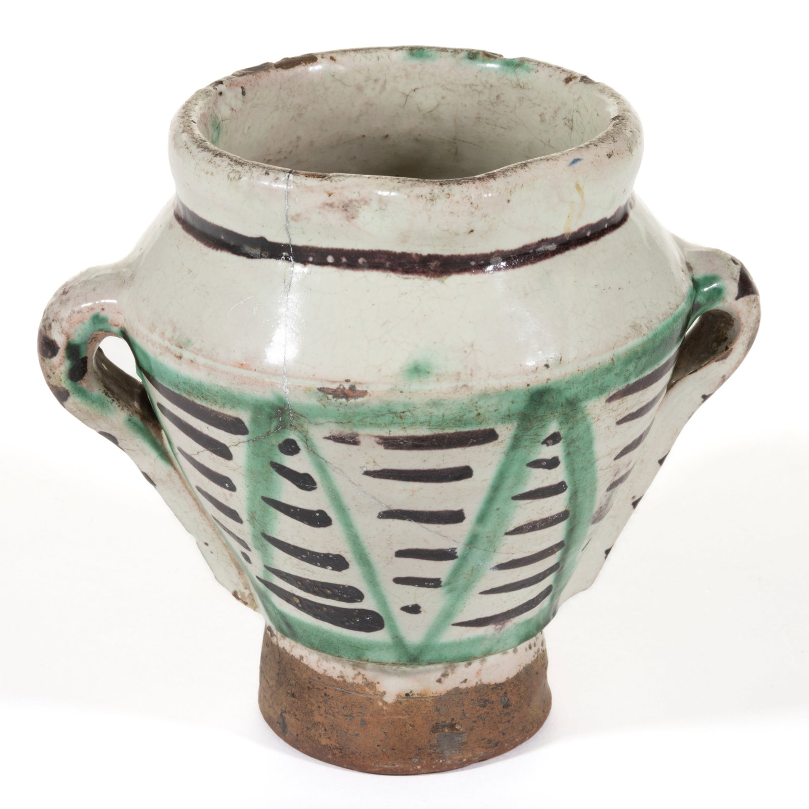 SPANISH MAIOLICA TIN-GLAZED HAND-PAINTED EARTHENWARE MORTAR: SPANISH MAIOLICA TIN-GLAZED HAND-PAINTED EARTHENWARE MORTAR, conical tri-handled form with a modest spout, featuring brown- and green-glazed geometric designs on white slip. Probably Teruel, Spain.&nb
